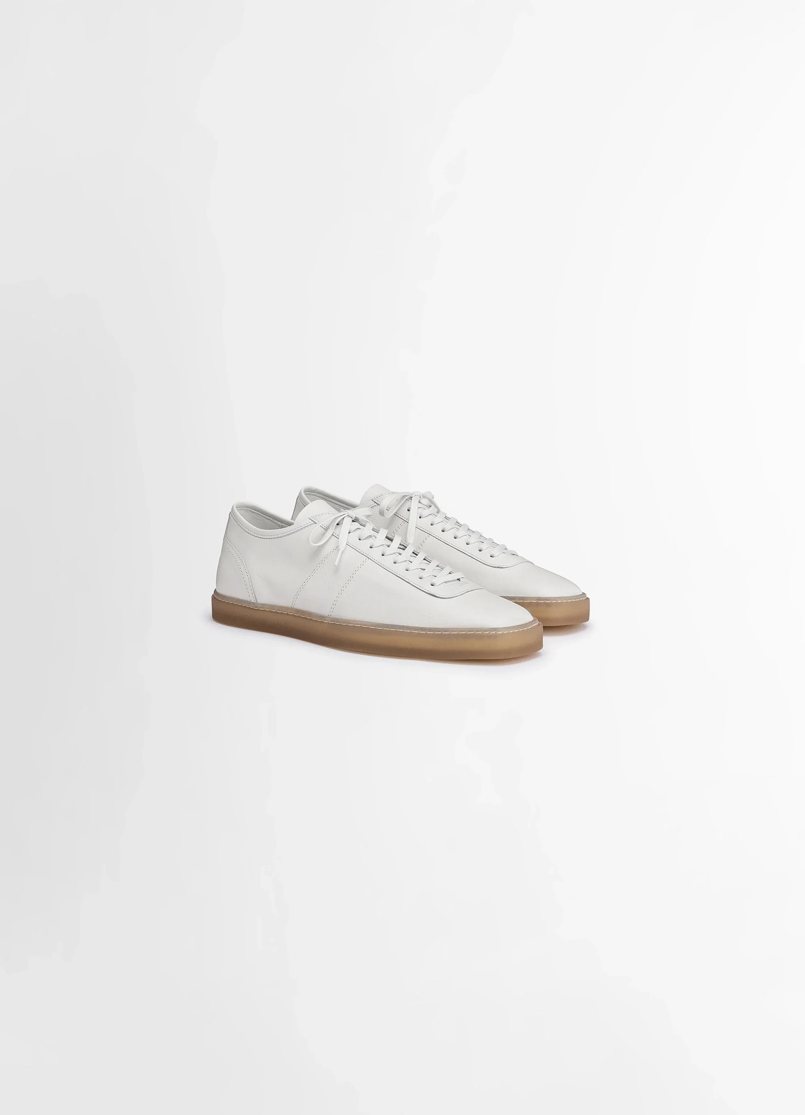 Lemaire linoleum laced up trainers in smooth soft cow leather, product shot, three-quarter view angled laces, low profile