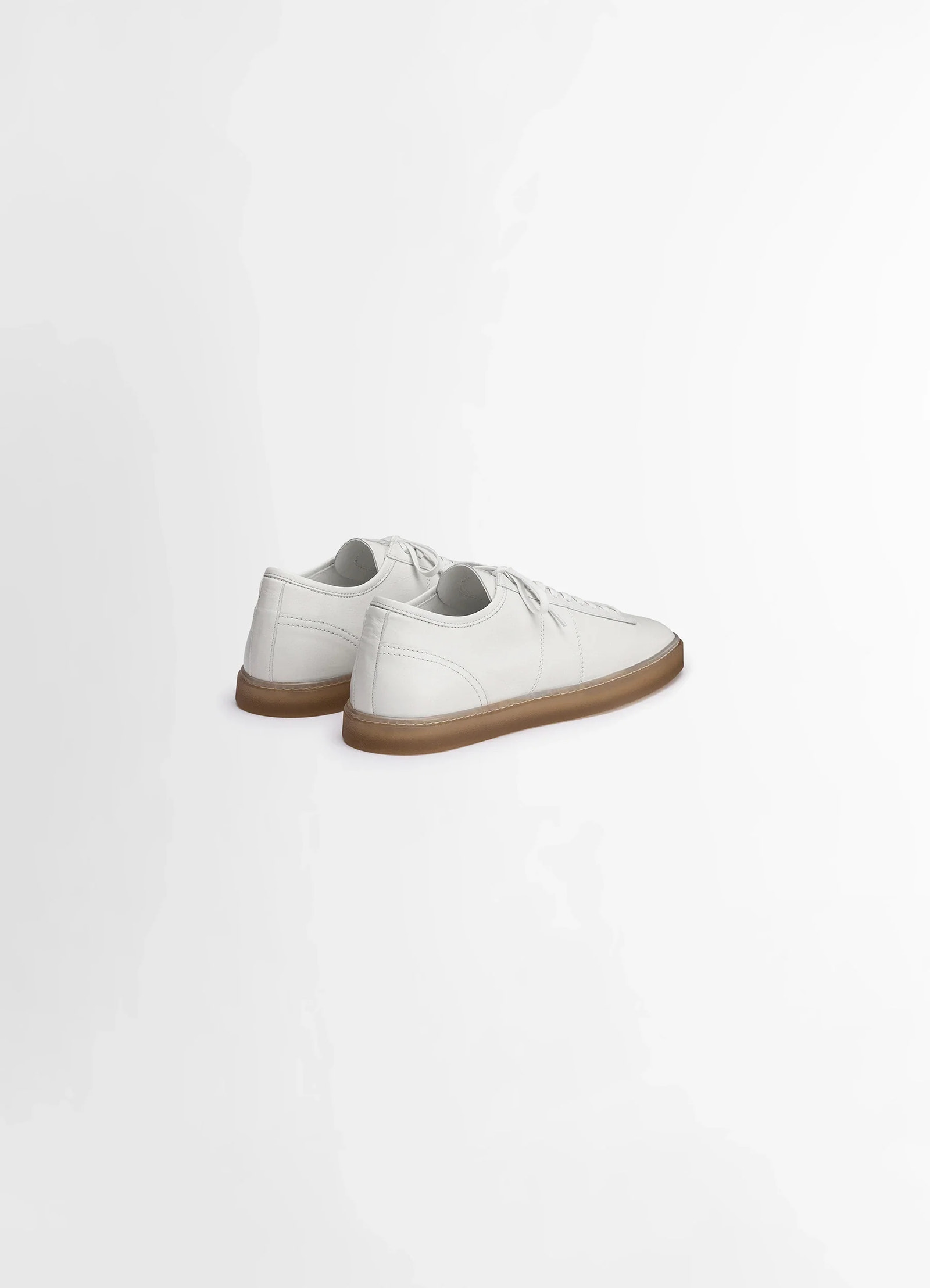 Lemaire linoleum laced up trainers in smooth soft cow leather, product shot, rear three-quarter view contrasting sole, lace-u