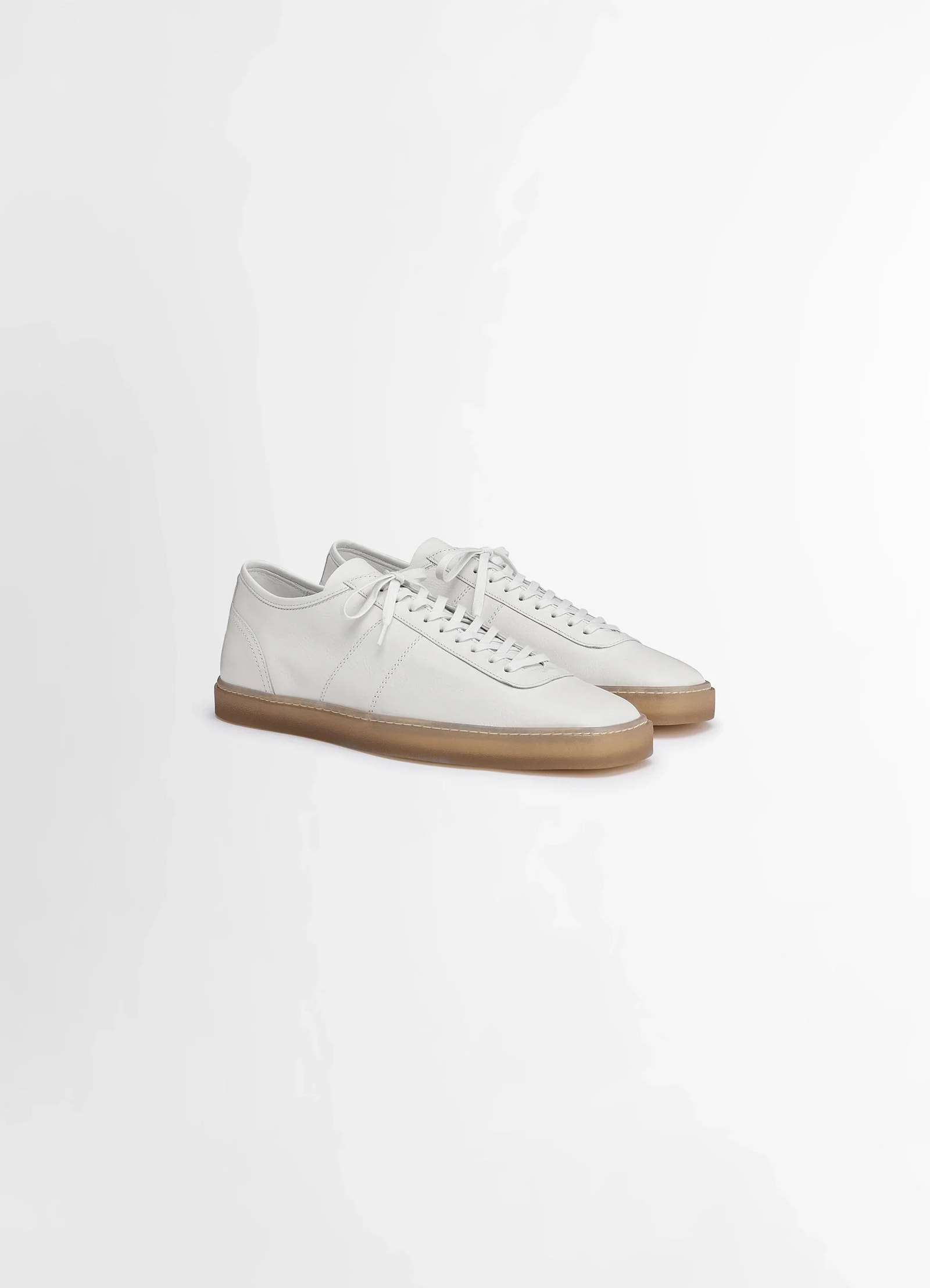 Lemaire linoleum laced up sneakers in smooth soft cow leather, product shot, angled front view thin laces, gum sole