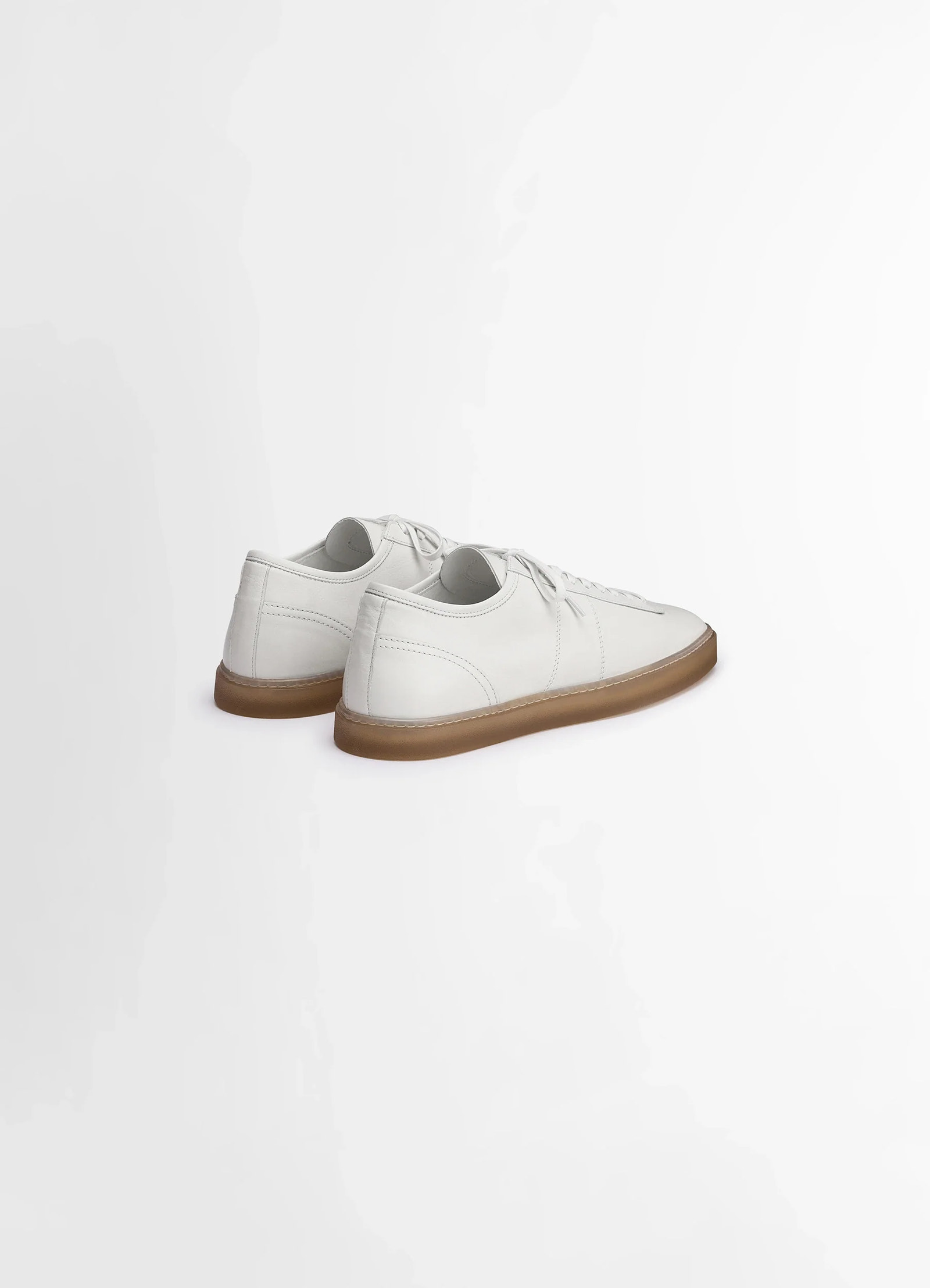 Lemaire linoleum laced up sneakers in smooth soft cow leather, product shot, back angled view gum sole contrast