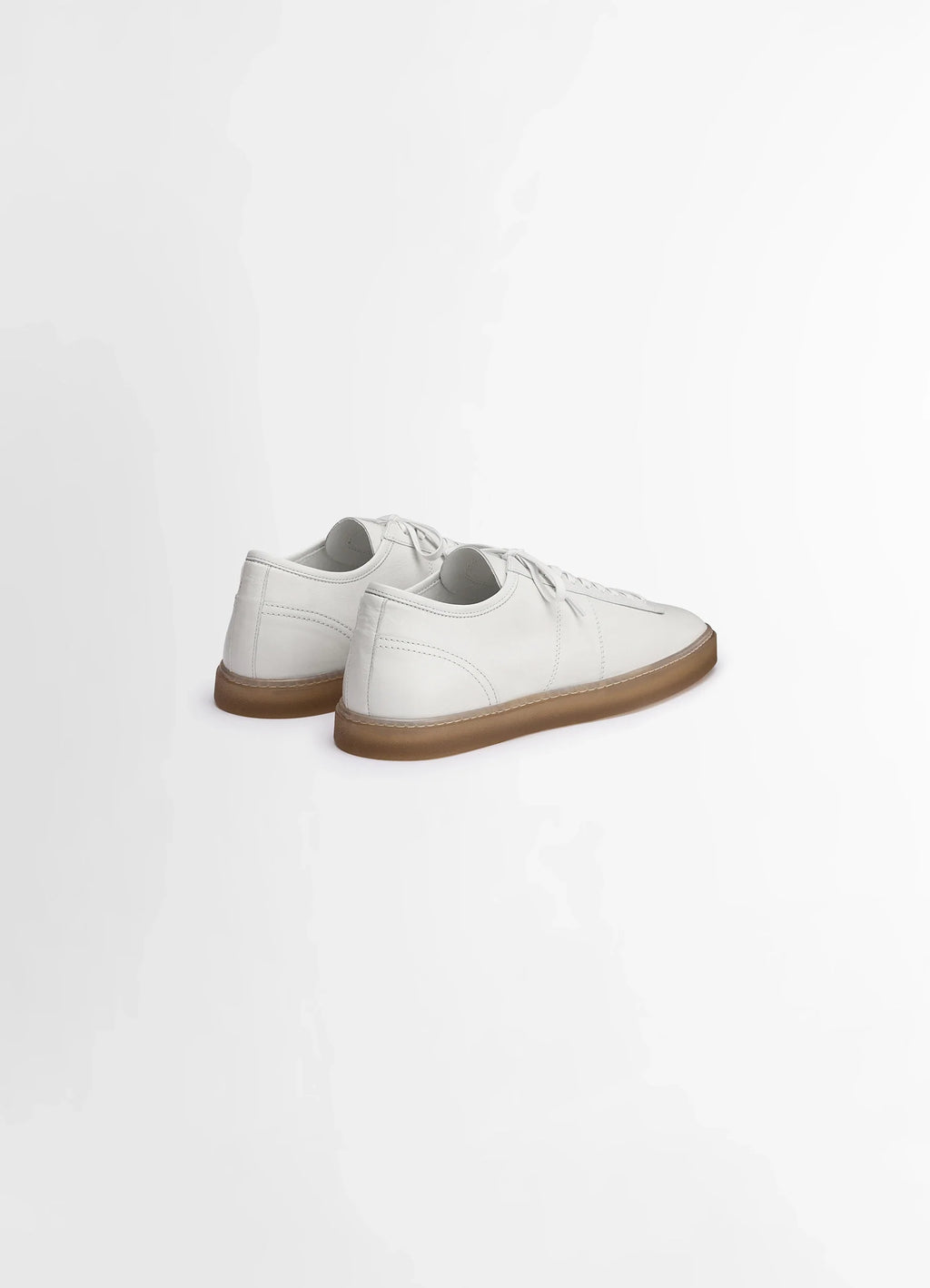 Lemaire Linoleum Laced Up Sneakers in Smooth soft cow leather, product shot, back angled view gum sole contrast