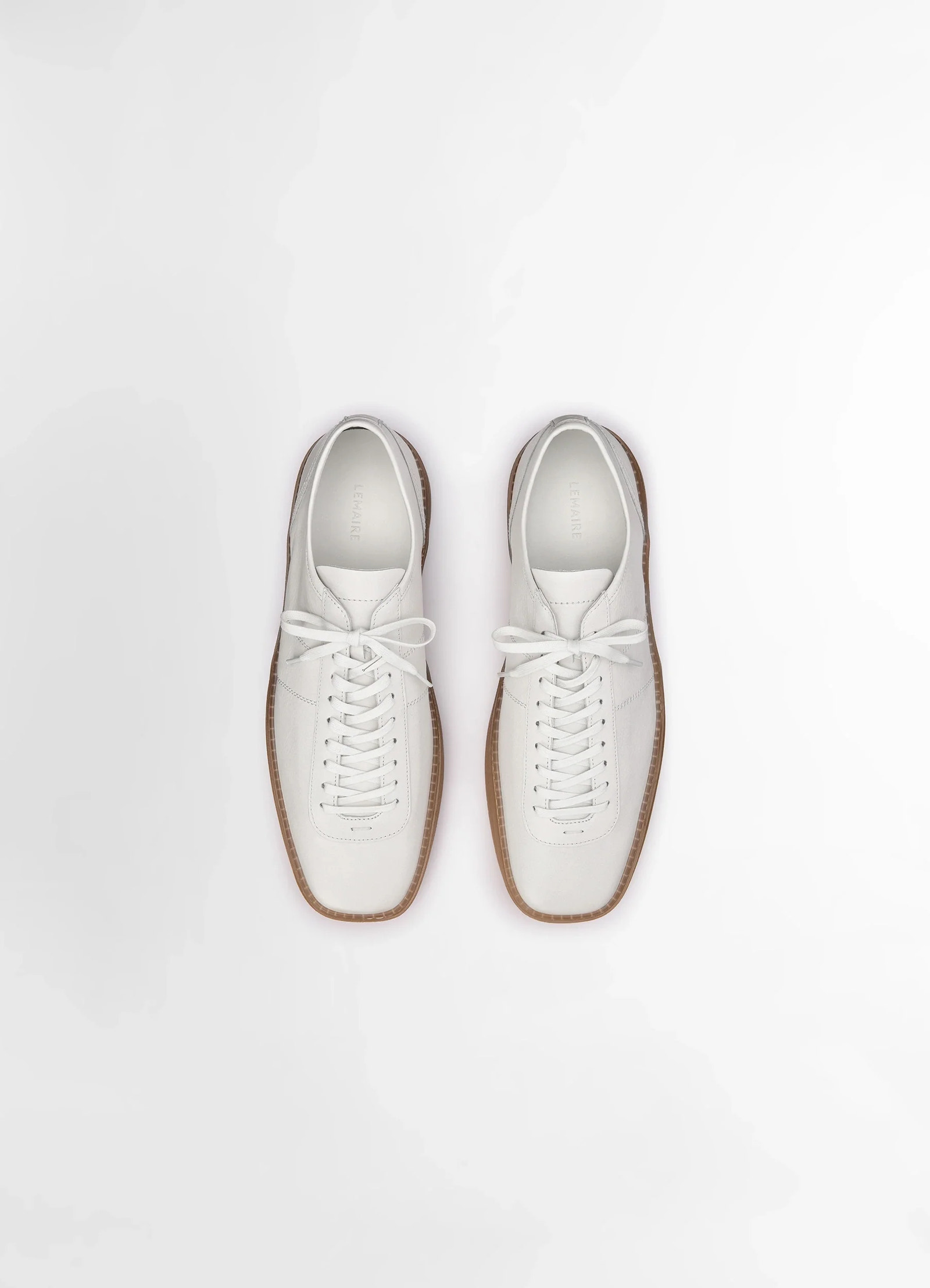 Lemaire linoleum laced up sneakers in smooth soft cow leather, product shot, overhead shot double laced sections