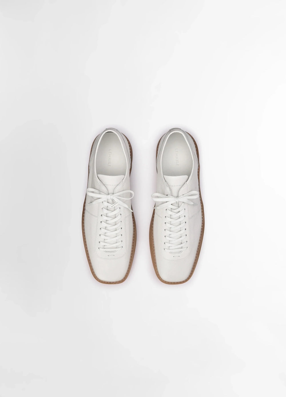 Lemaire Linoleum Laced Up Sneakers in Smooth soft cow leather, product shot, overhead shot double laced sections