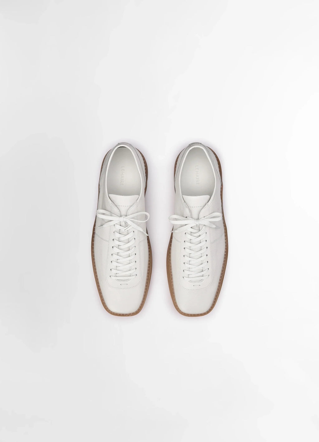 Lemaire Linoleum Laced Up Sneakers in Smooth soft cow leather, product shot, overhead shot double laced sections