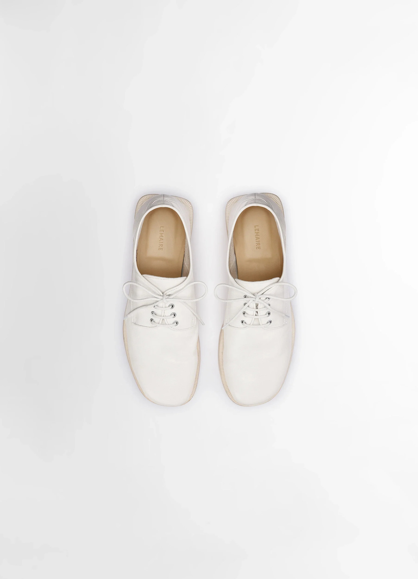 Anatomic derbies in soft buffalo grained leather, product shot, top view unlined with almond toe