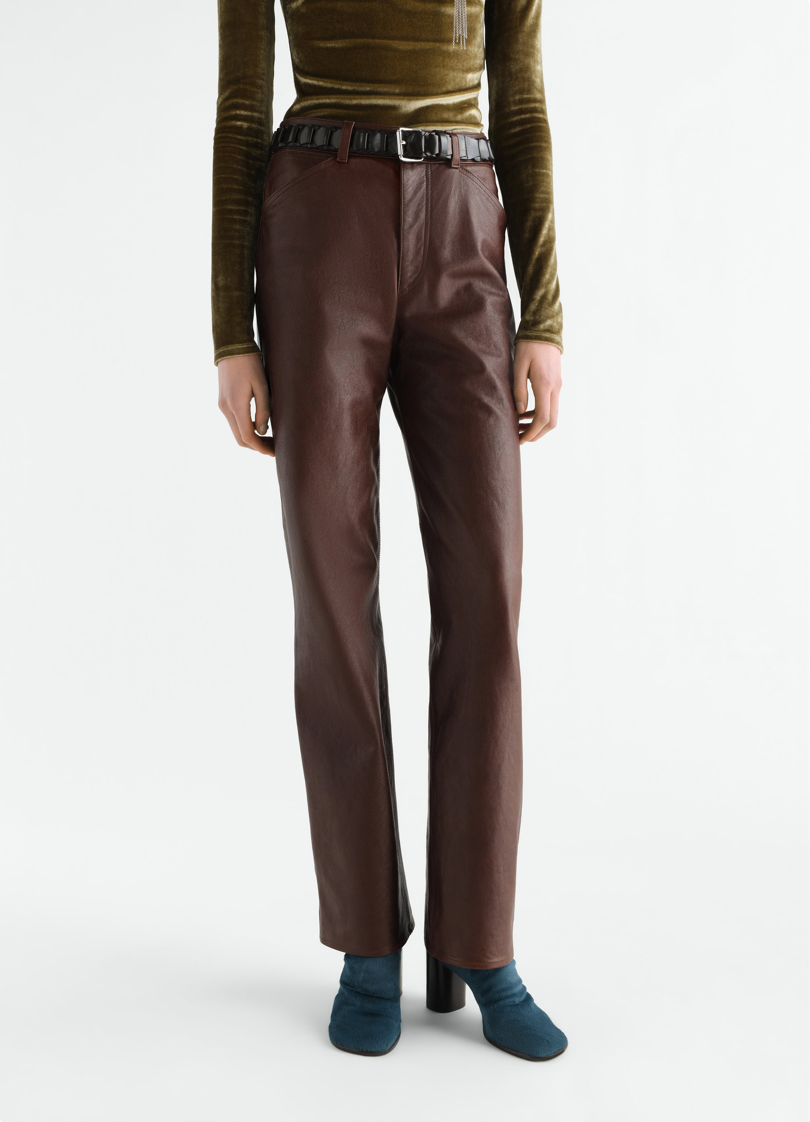 Brown leather pants with black belt worn by a model front view lemaire