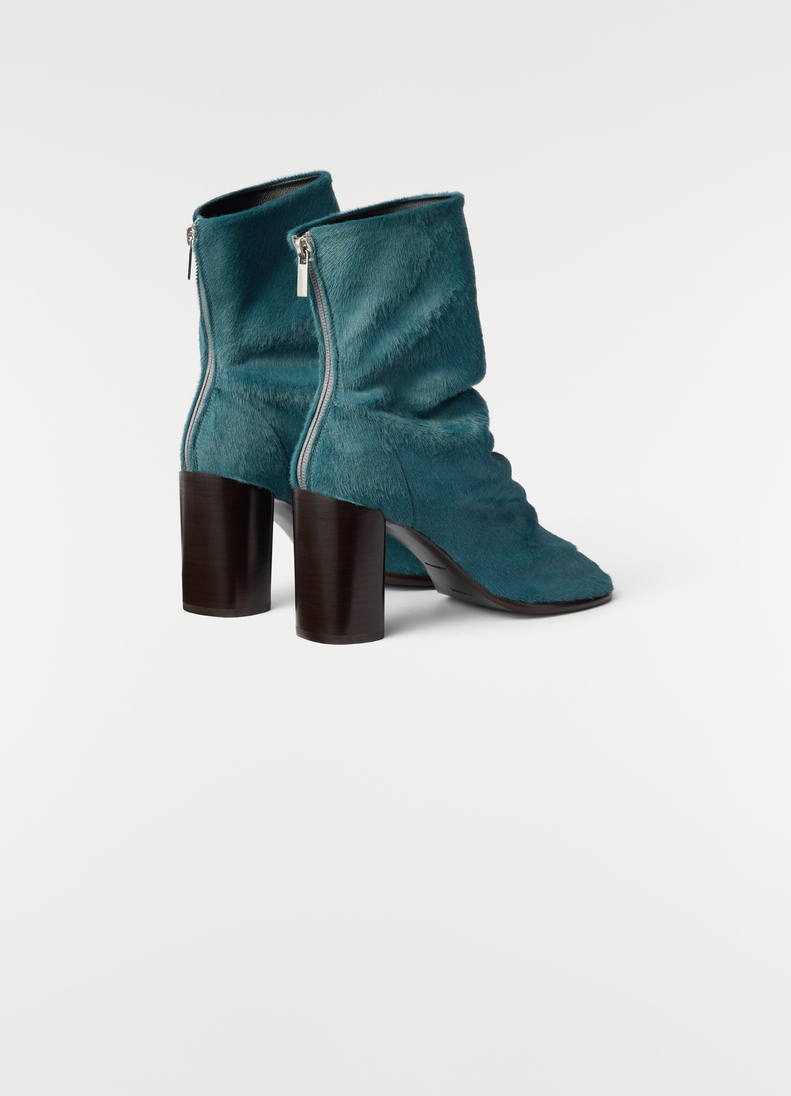 80 mm glove heeled ankle boots in teal pony-style leather with back zipper by lemaire side view on white background