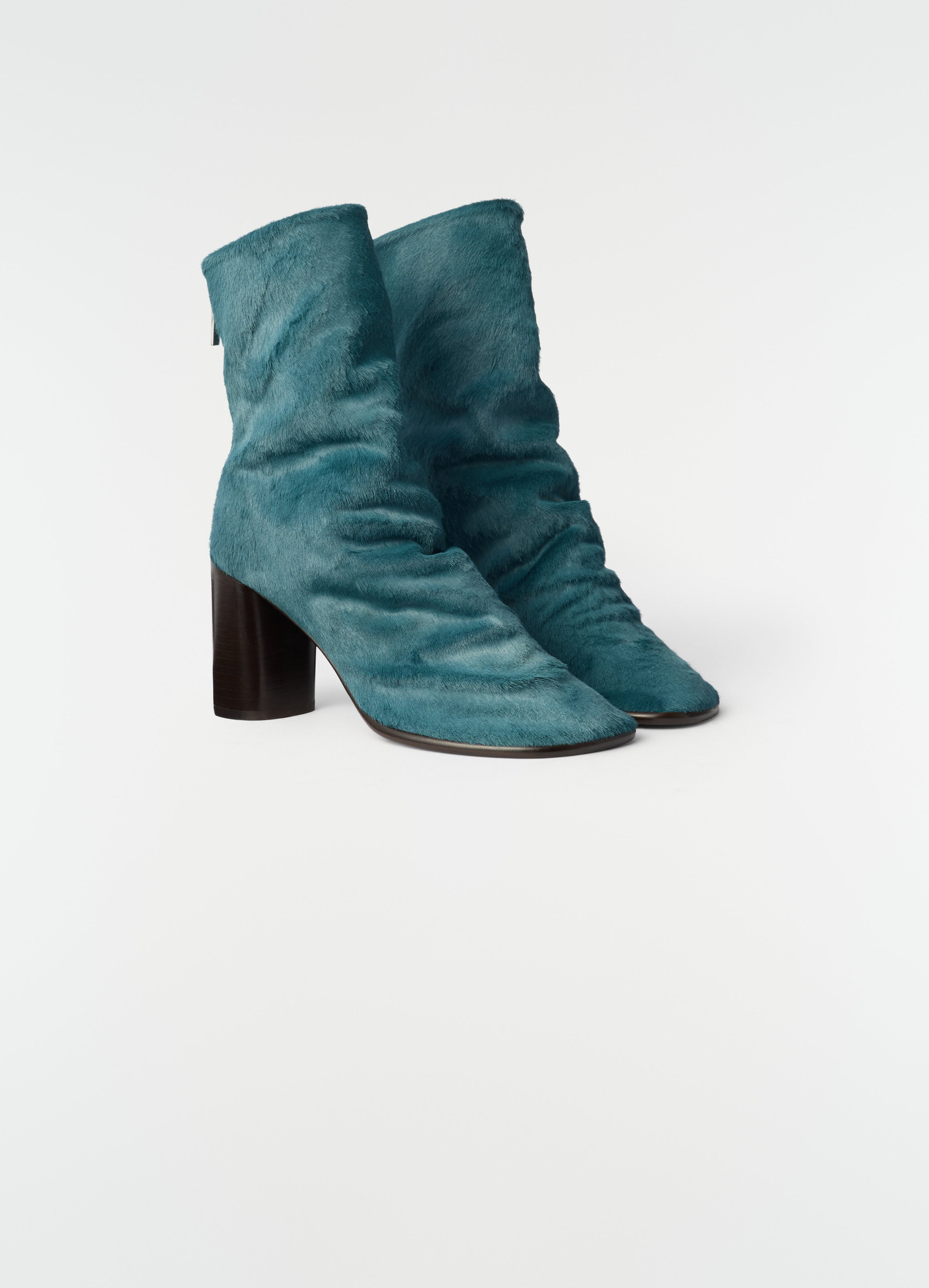 Blue pony-style leather ankle boots with 80mm heel by lemaire front view on plain white background