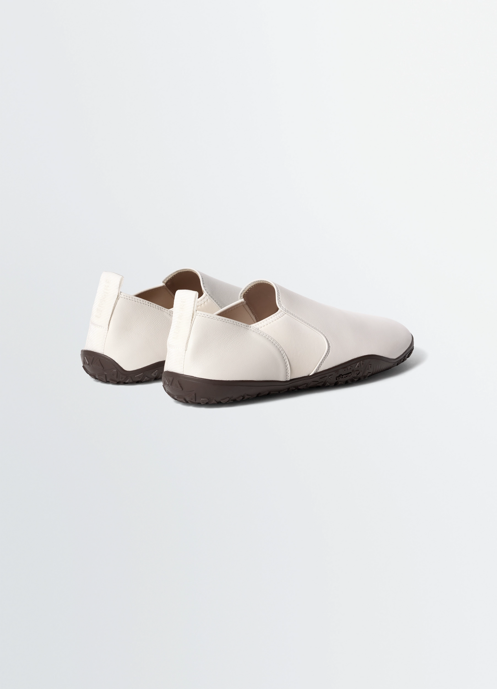 Vibram glove slip on in leather, product shot, rear three-quarter view pull tab detail