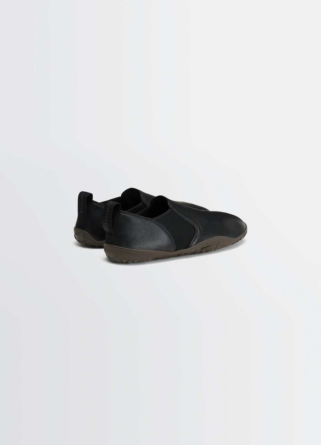 VIBRAM GLOVE SLIP ON in Black nappa lamb leather, product shot, rear three-quarter view elastic insert, pull tab