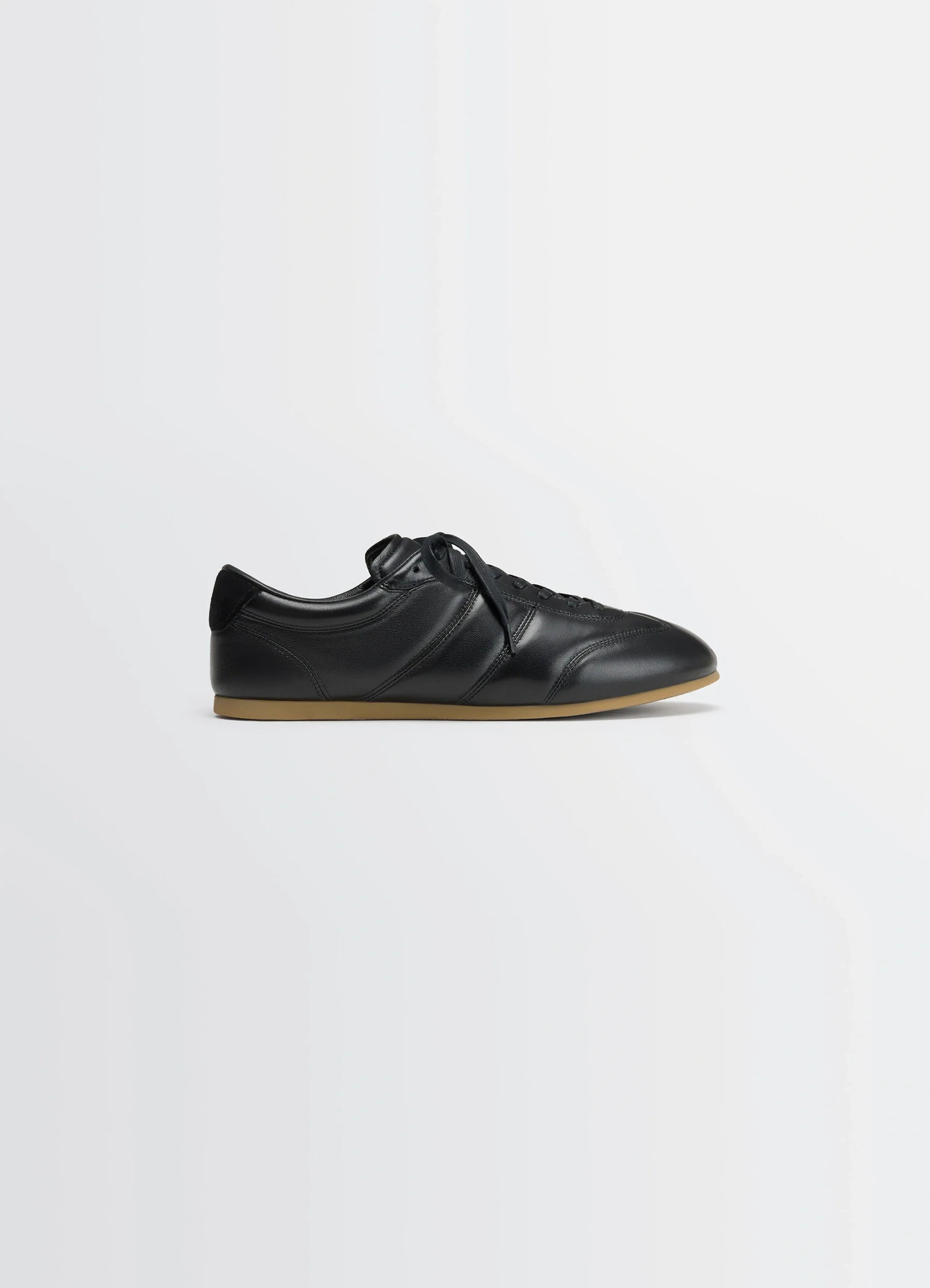 Vintage running sneakers in black nappa lamb leather, product shot, side view rubber-soled, stitched panels