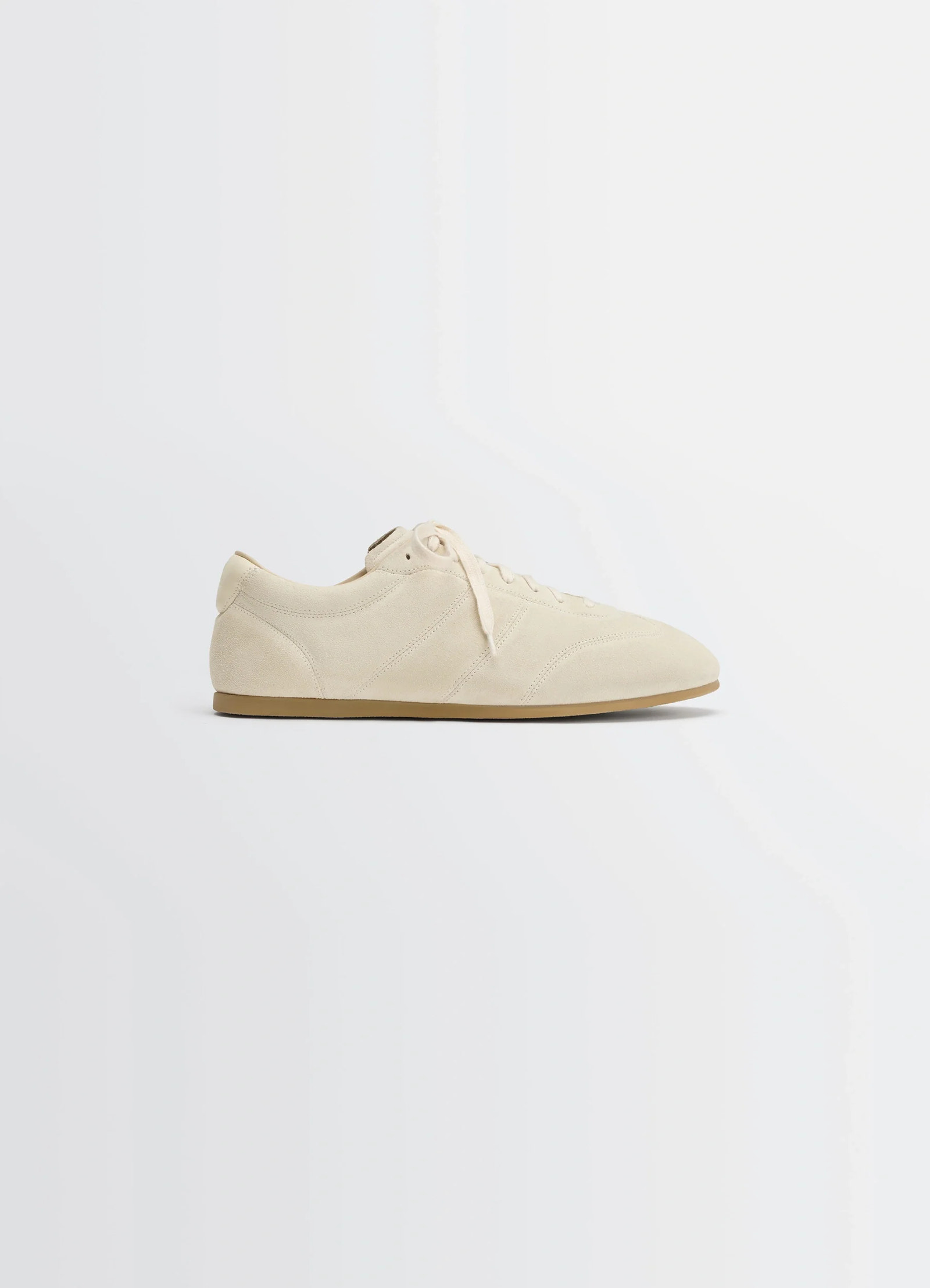 Soft runner in cream hand-sueded lambskin, product shot, side view rubber-soled, stitched panels