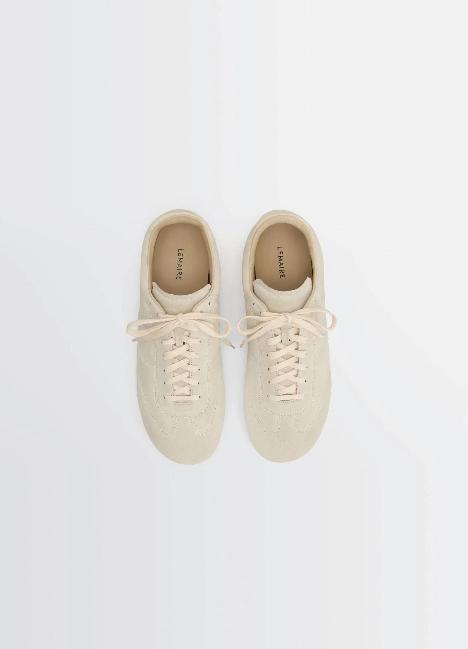 Soft runner in cream hand-sueded lambskin, product shot, top-down view twin-laced design