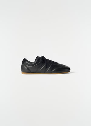 Soft runner in leather