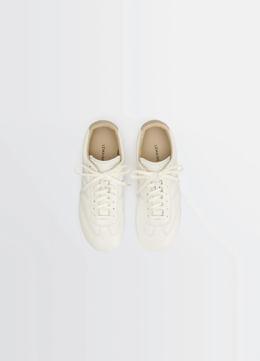 Soft Runner Sneakers in LWG Gold nappa lamb leather, product shot, top view laced front