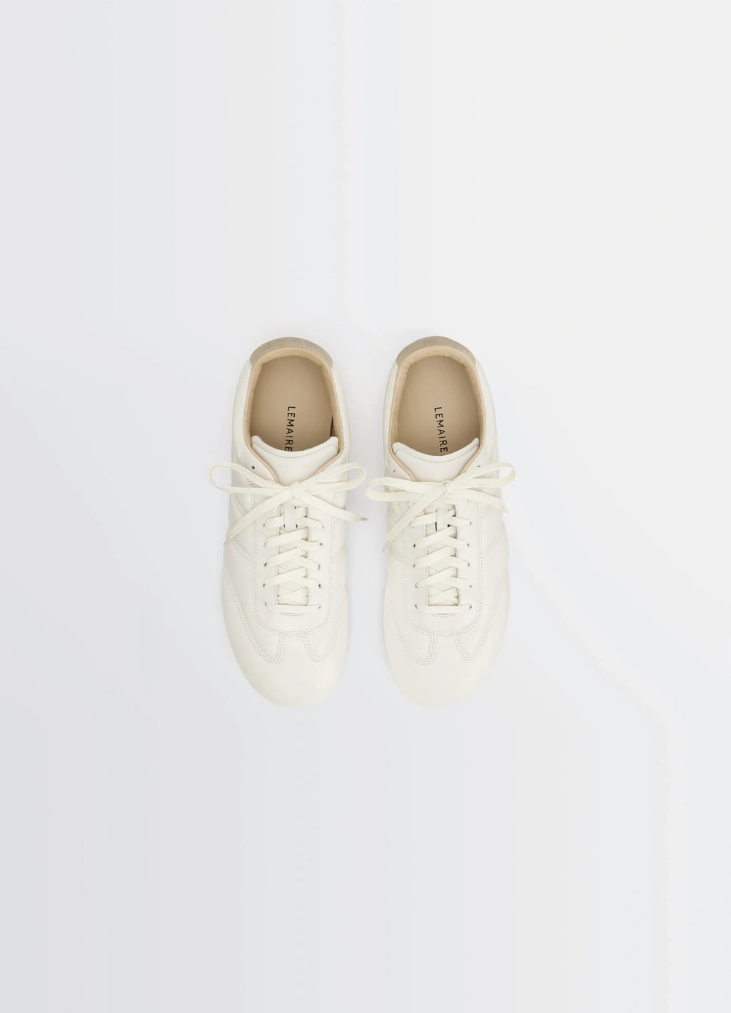 Soft Runner Sneakers in LWG Gold nappa lamb leather, product shot, top view laced front