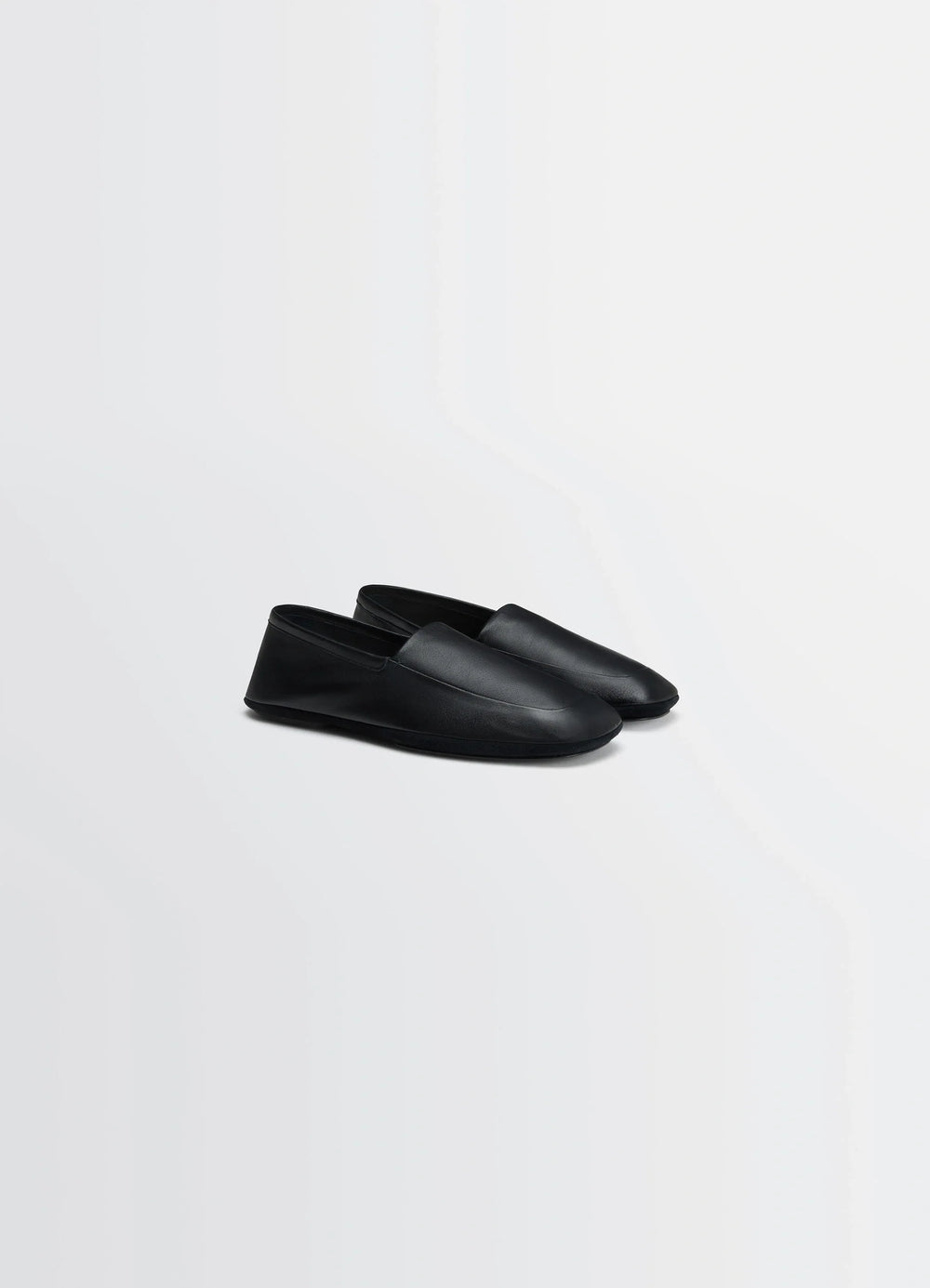 LWG Gold Indoor Slippers in Nappa Lamb Leather Black, product shot, three-quarter view sleek minimalist design