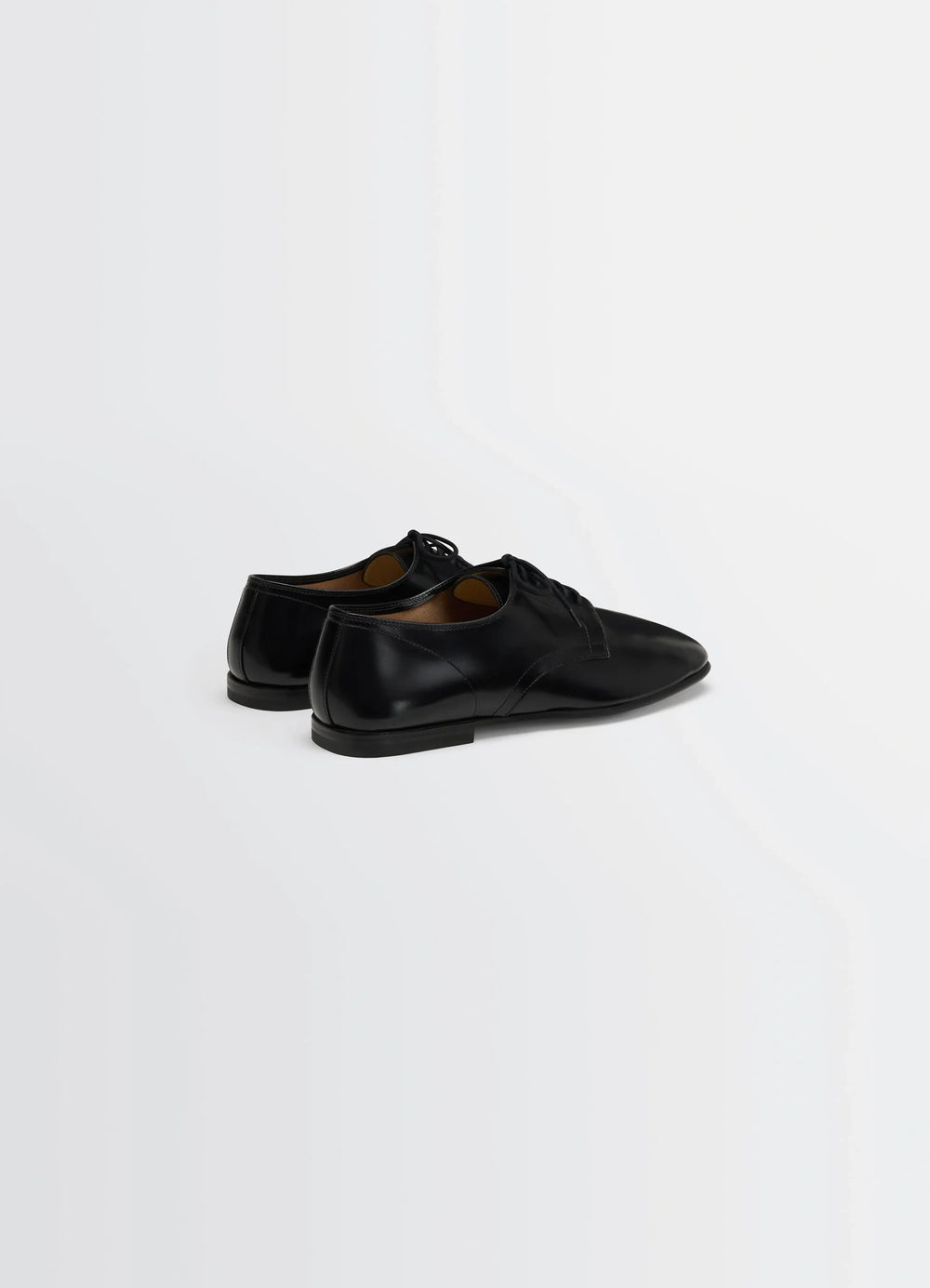 Lemaire Dance Derbies in Black Calf Leather, product shot, back angled view low heel classic design