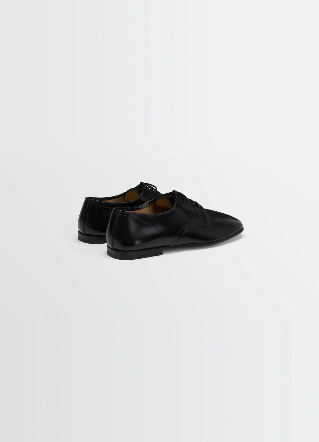 Lemaire Dance Derbies in Black Calf Leather, product shot, back angled view low heel classic design