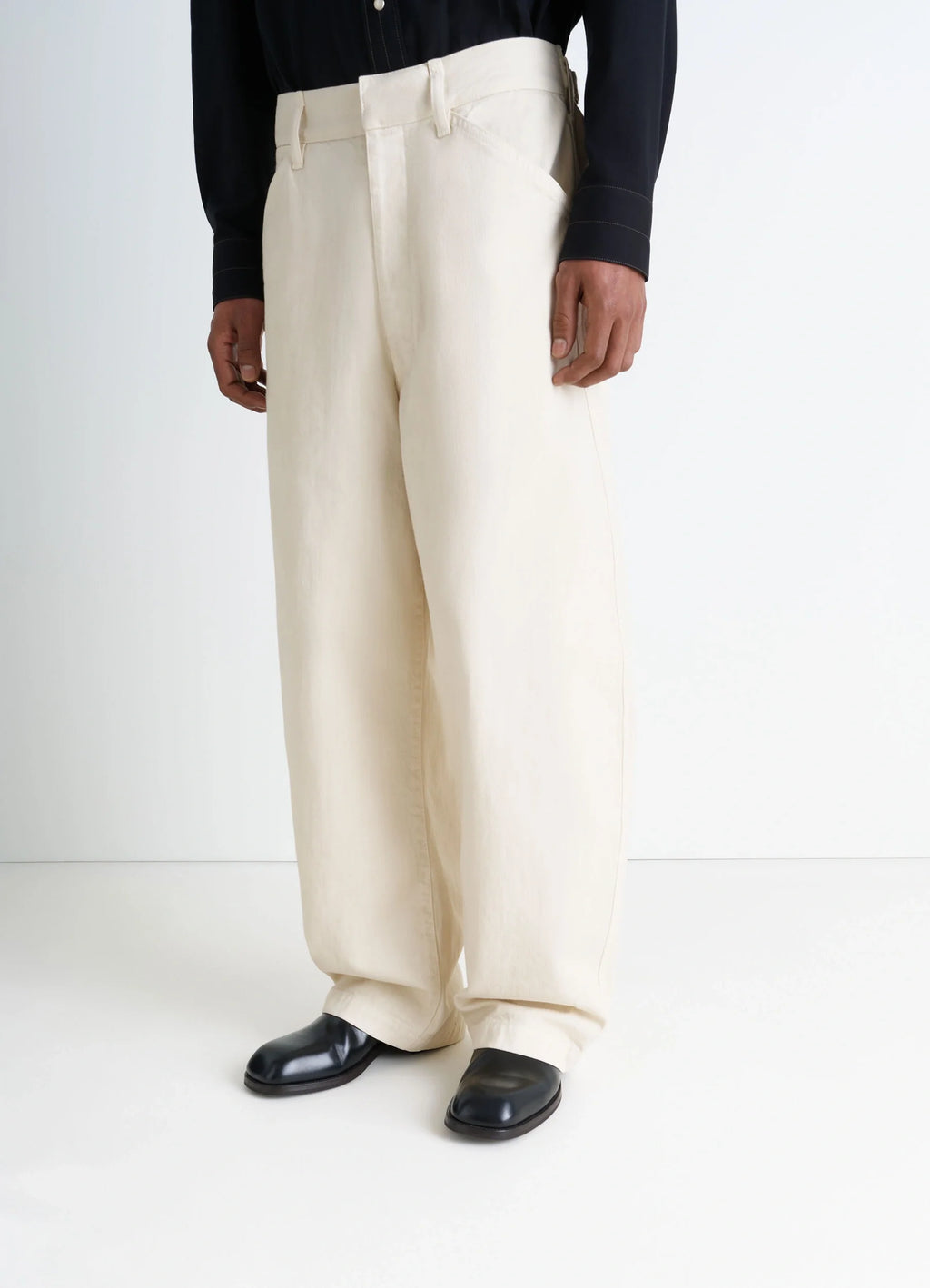 Zipped Boots in Black Calf Leather, model shot, detail shot square toe design