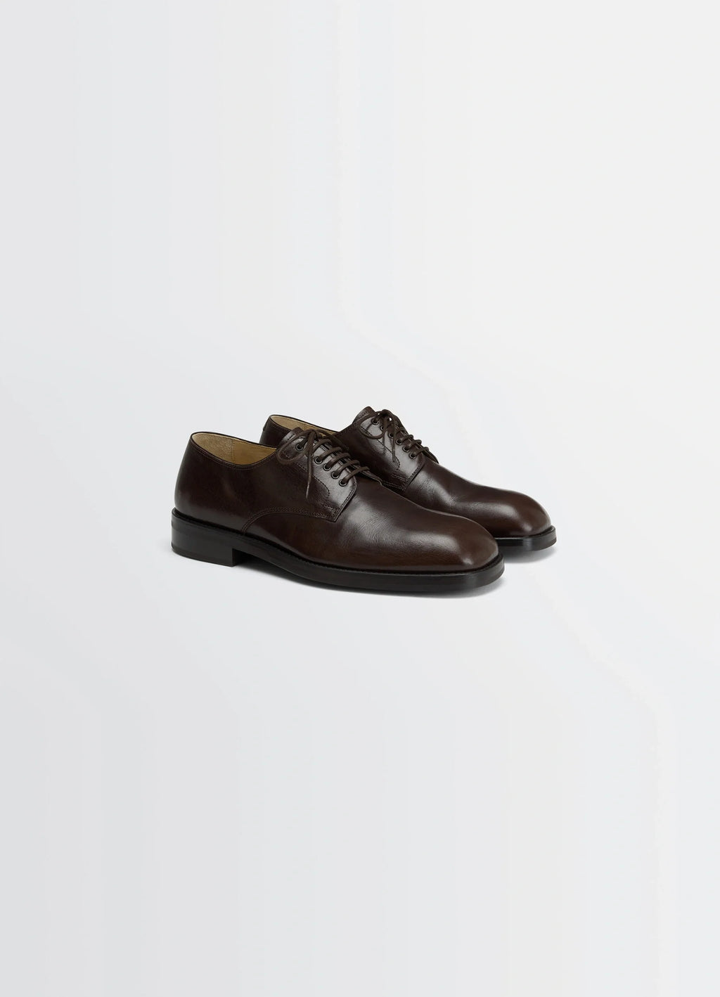 Derbies in Glossy Buffalo Leather, product shot, angled top view sleek almond toe design