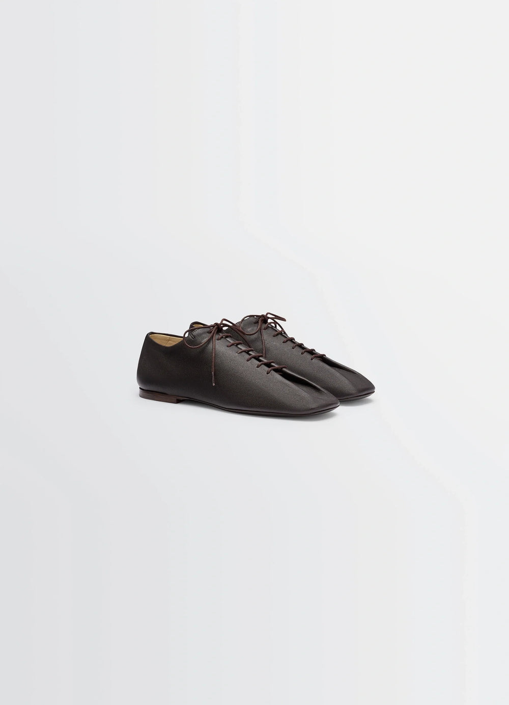 Souris Flat Classic Derbies in Washed Nappa Lambskin Leather, product shot, three-quarter view minimalist lace-up design