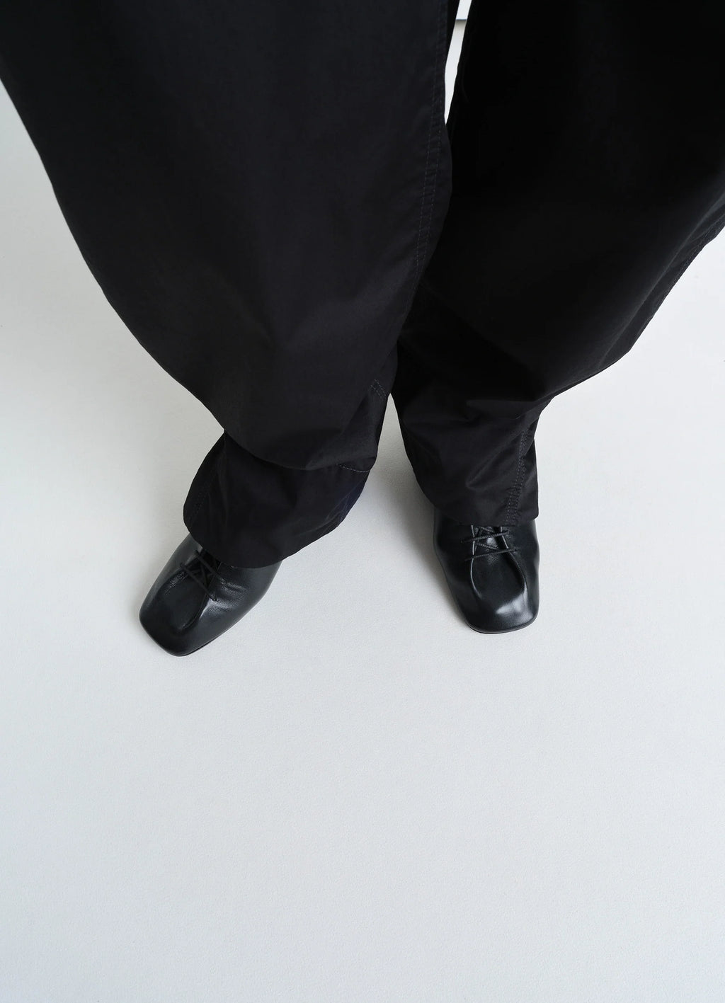 Souris Classic Derbies 55 in Black Nappa Lamb Leather, model shot, top-down view square toe lace-up