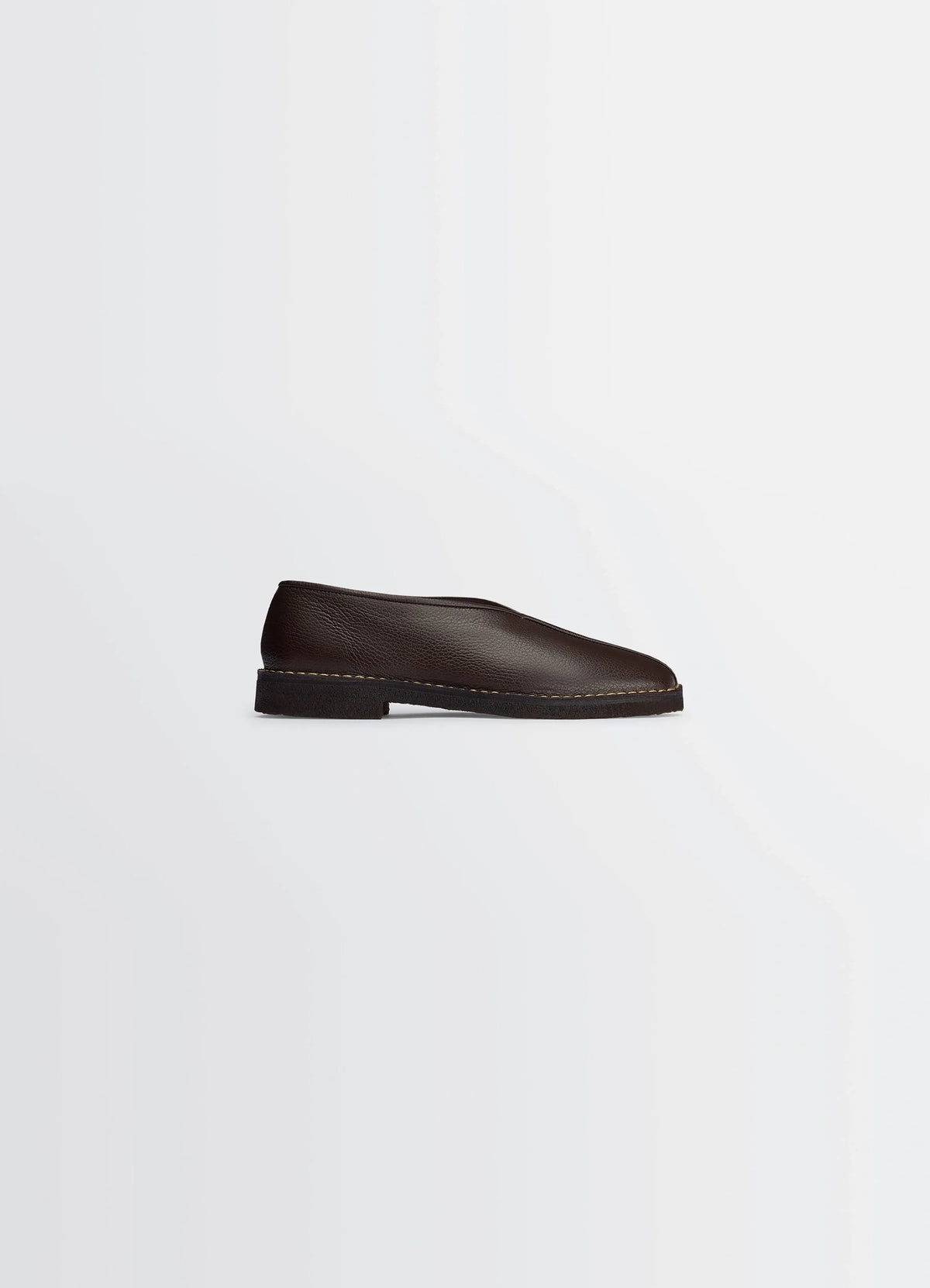 Lemaire Piped Crepe Slippers in Brown LWG Gold-certified leather, product shot, side view textured grained appearance
