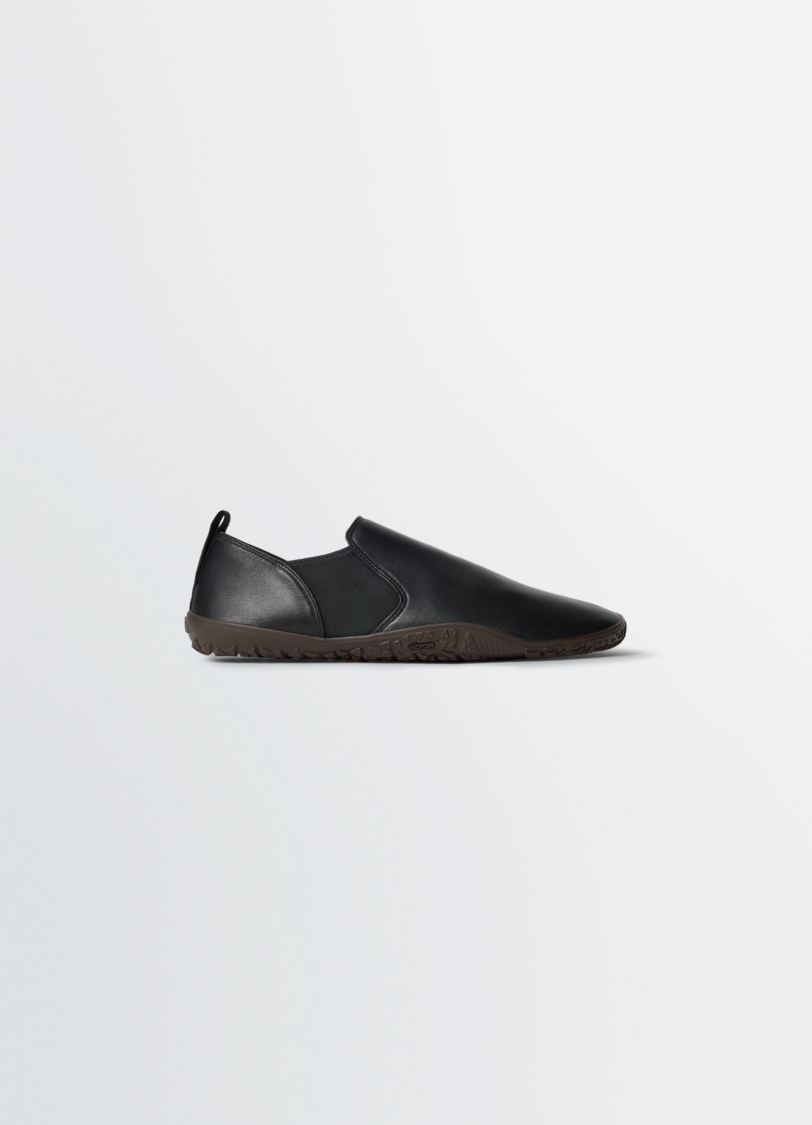 Vibram glove slip on in leather, product shot, side view glove-like fit