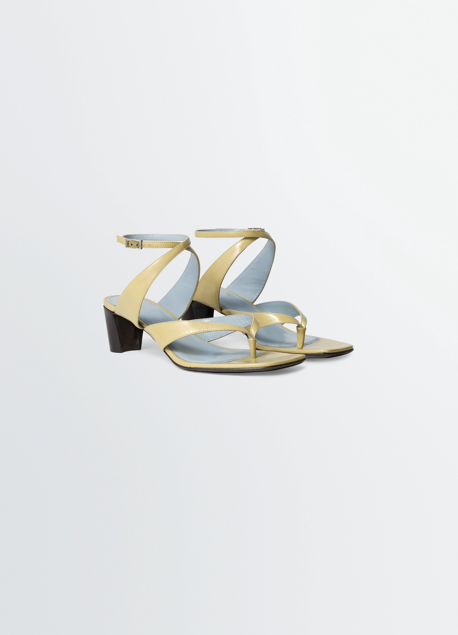 Tong sandals 50 mm heel in glossy calfskin leather, product shot, angled view cross strap design