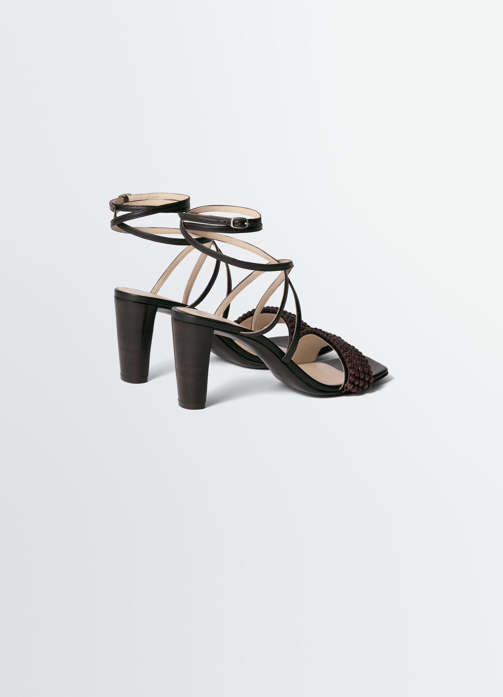 Cross sandals 80 mm heel in leather with beads, product shot, back angle crisscross straps