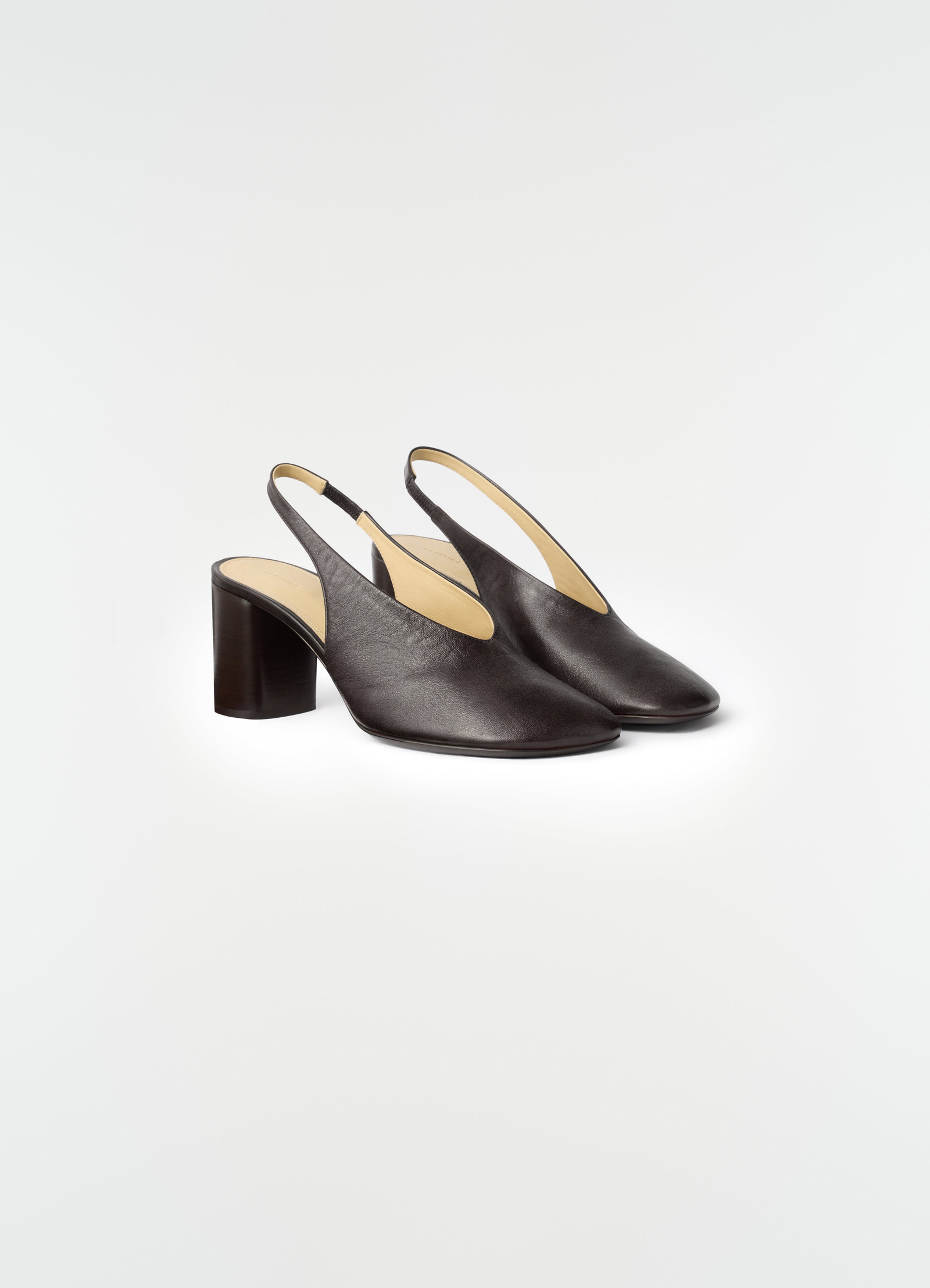 80 mm dark brown lambskin slingback pumps with block heel by lemaire on plain white background