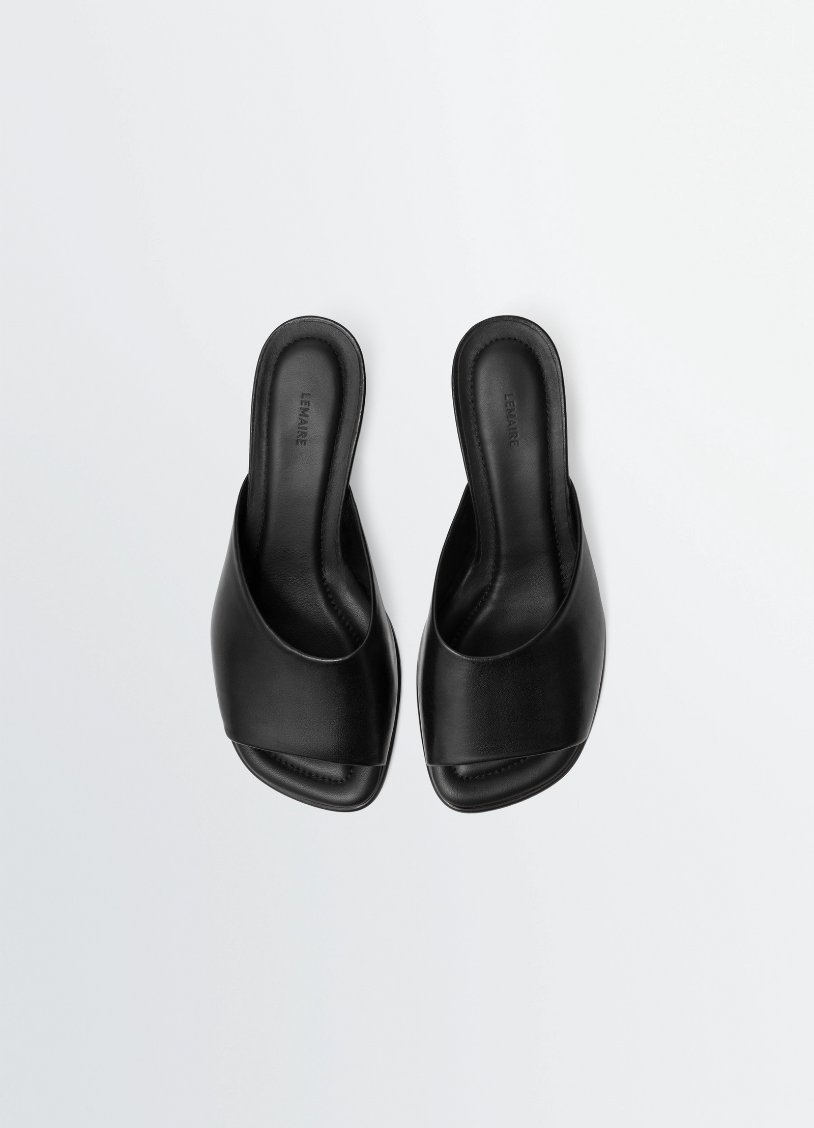 Square-heeled mules 55 mm in leather, product shot, top view open toe design