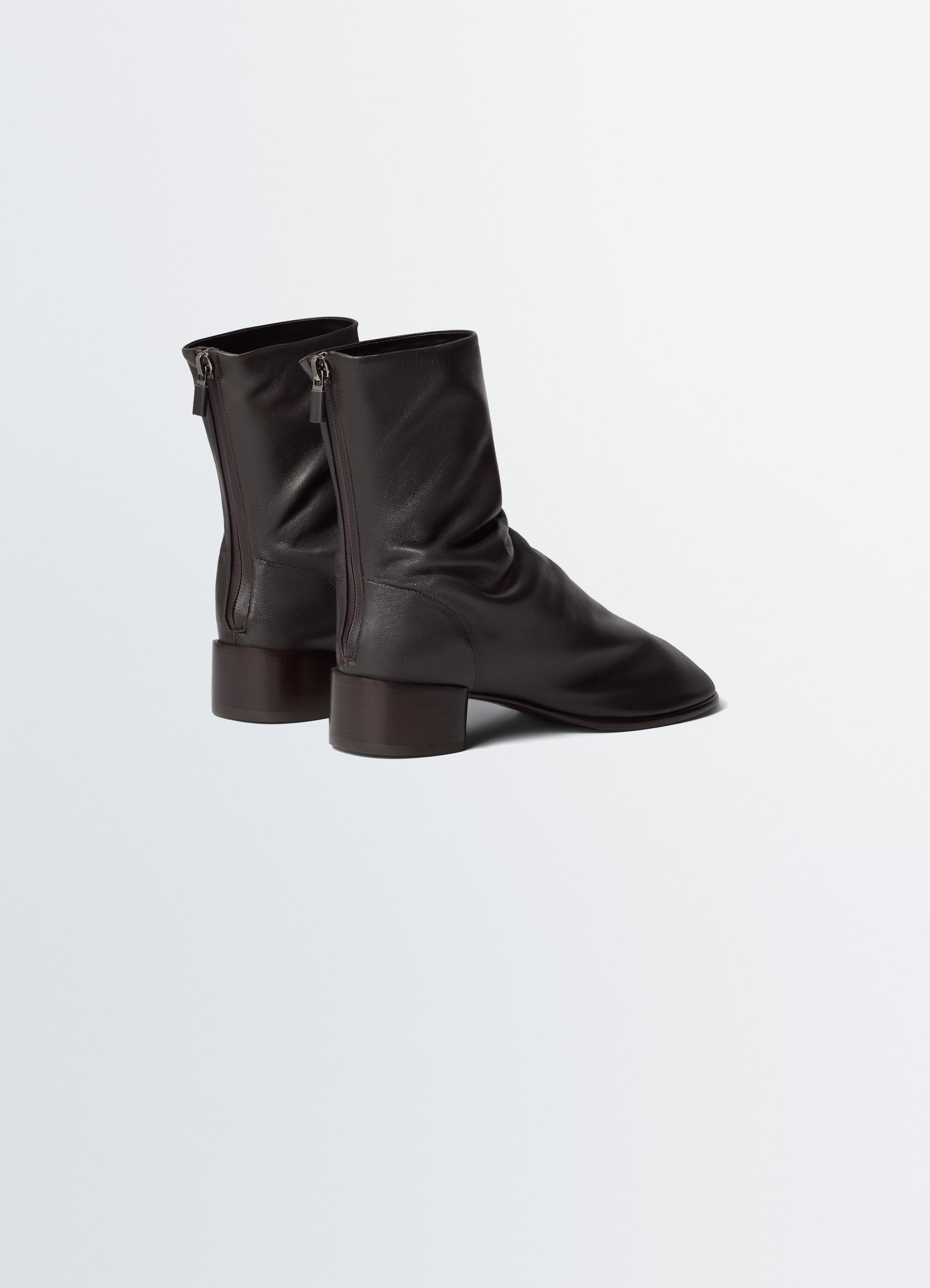 Glove boots 30 mm heel in lambskin leather, product shot, rear three-quarter view zippered back detail