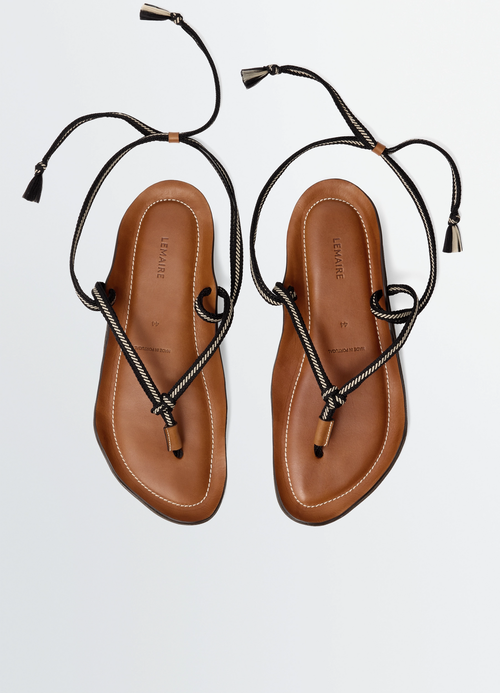 Vibram sandals in leather, product shot, top down view looped black laces