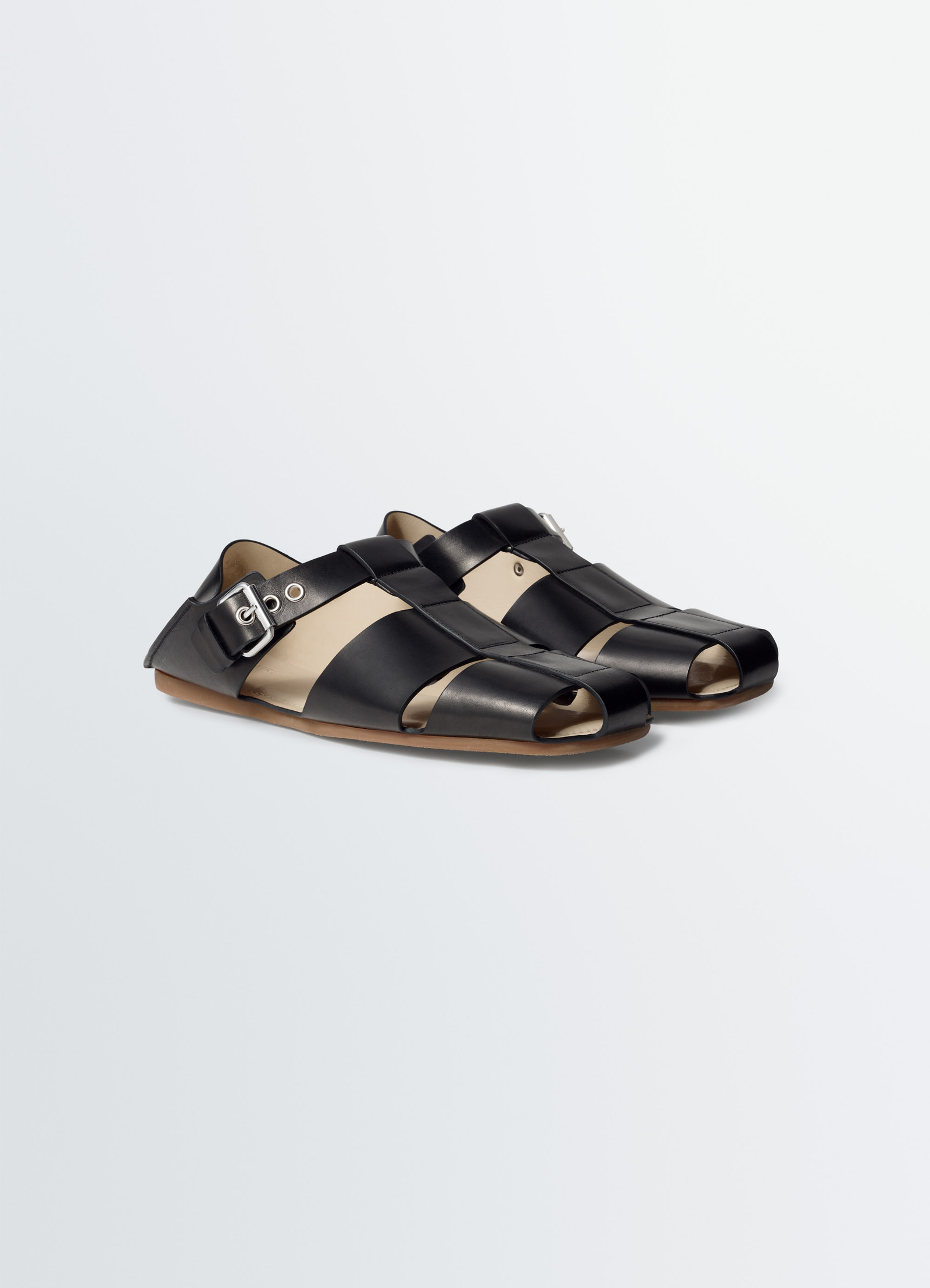 Fisherman slip-on sandals in leather, product shot, three-quarter view buckle strap visible