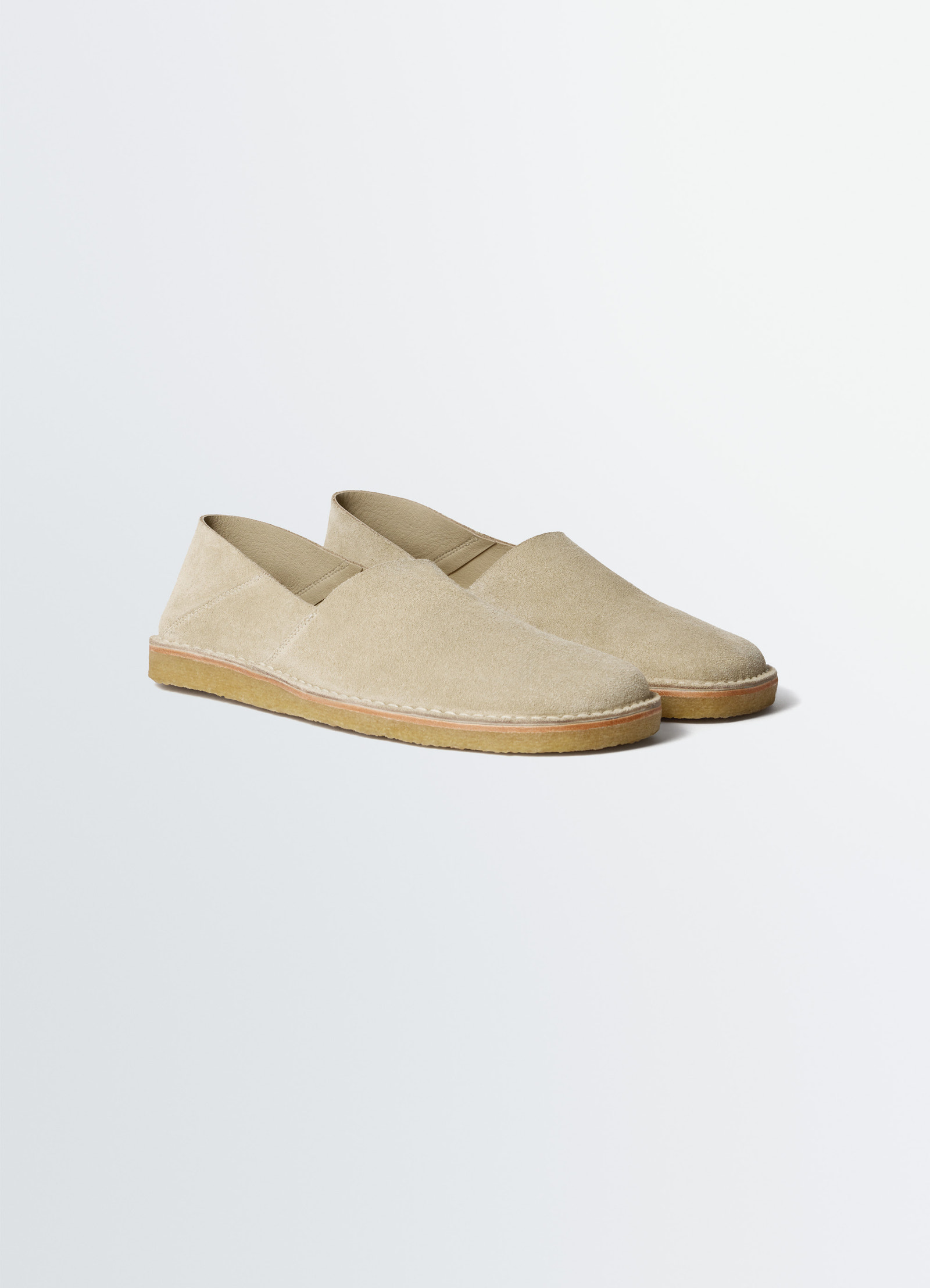 Square slip-on loafers in suede leather, product shot, back angled view stitched seams detail