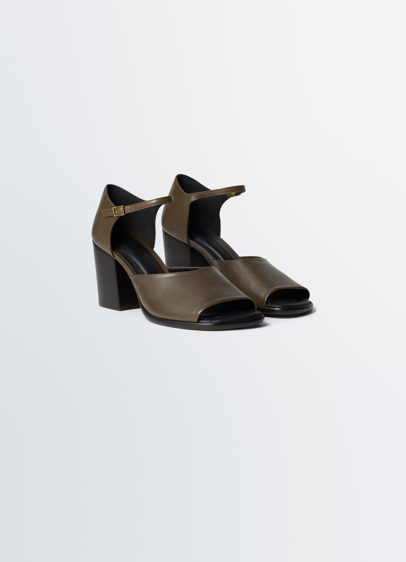 Heeled sandals in glossy leather, product shot, three-quarter view ankle strap