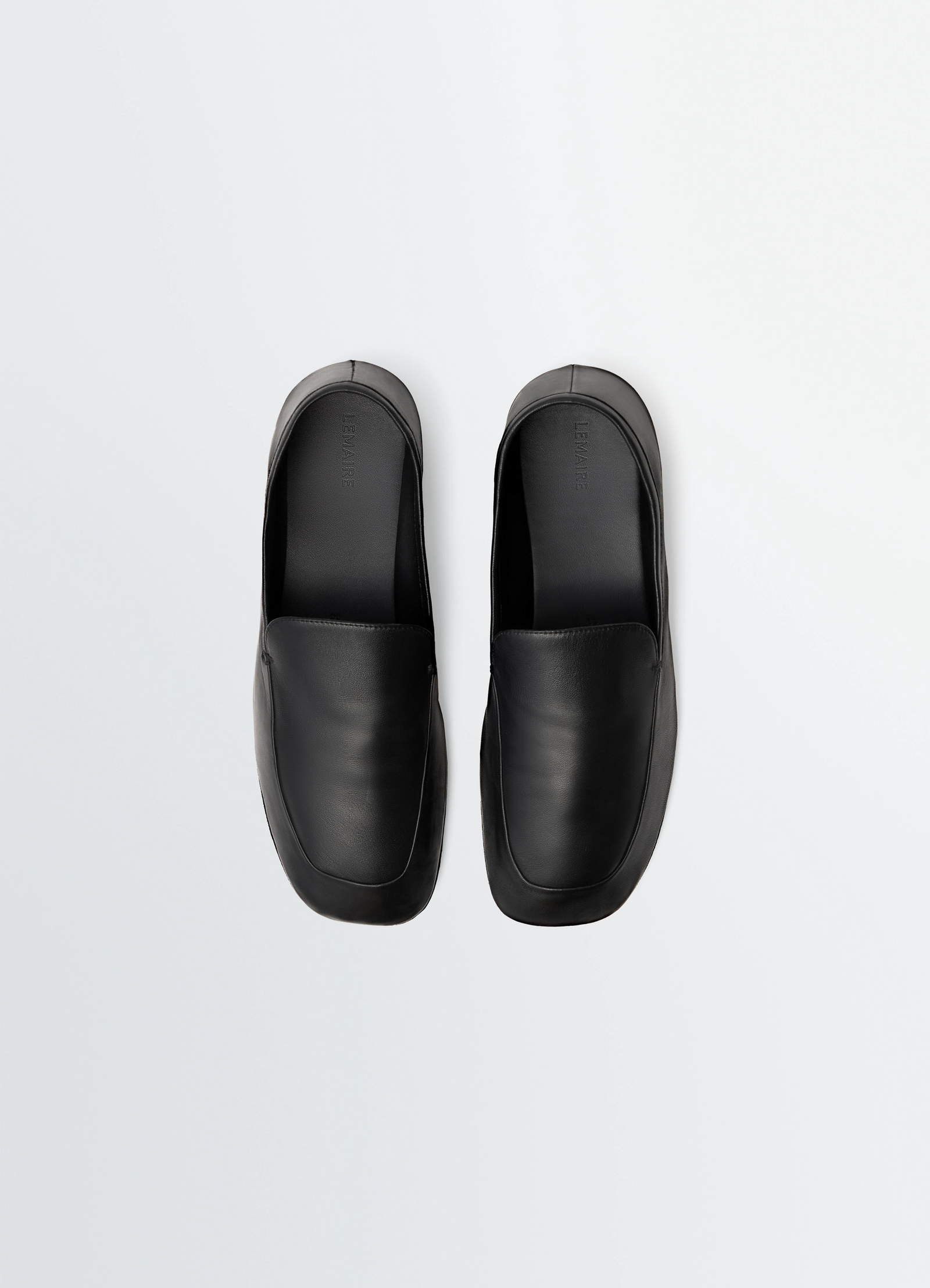 Outdoor slippers in leather in black nappa lambskin, product shot, top view square toe minimalist