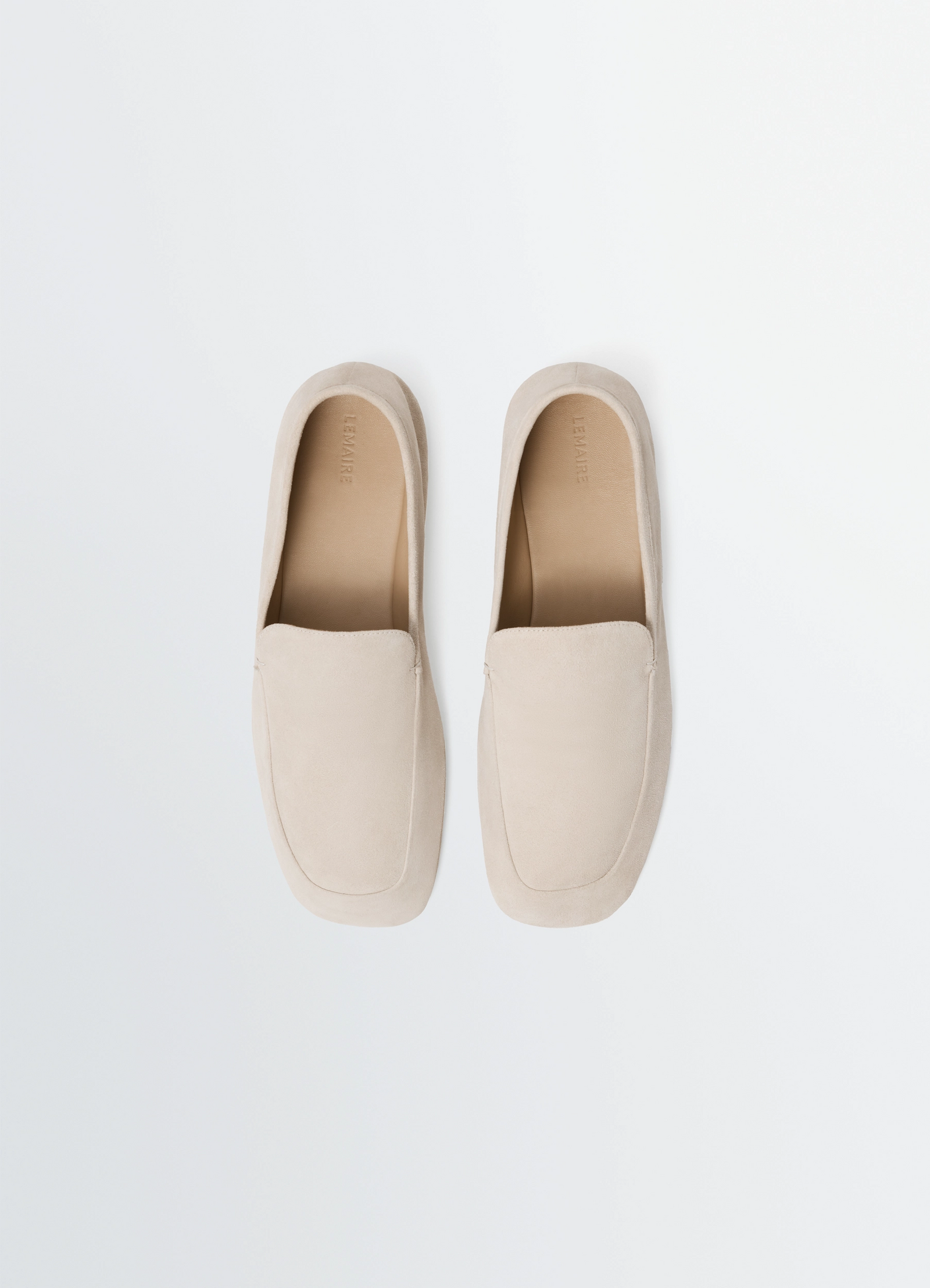 Outdoor slippers in suede leather in suede leather, product shot, top view neutral background minimalism