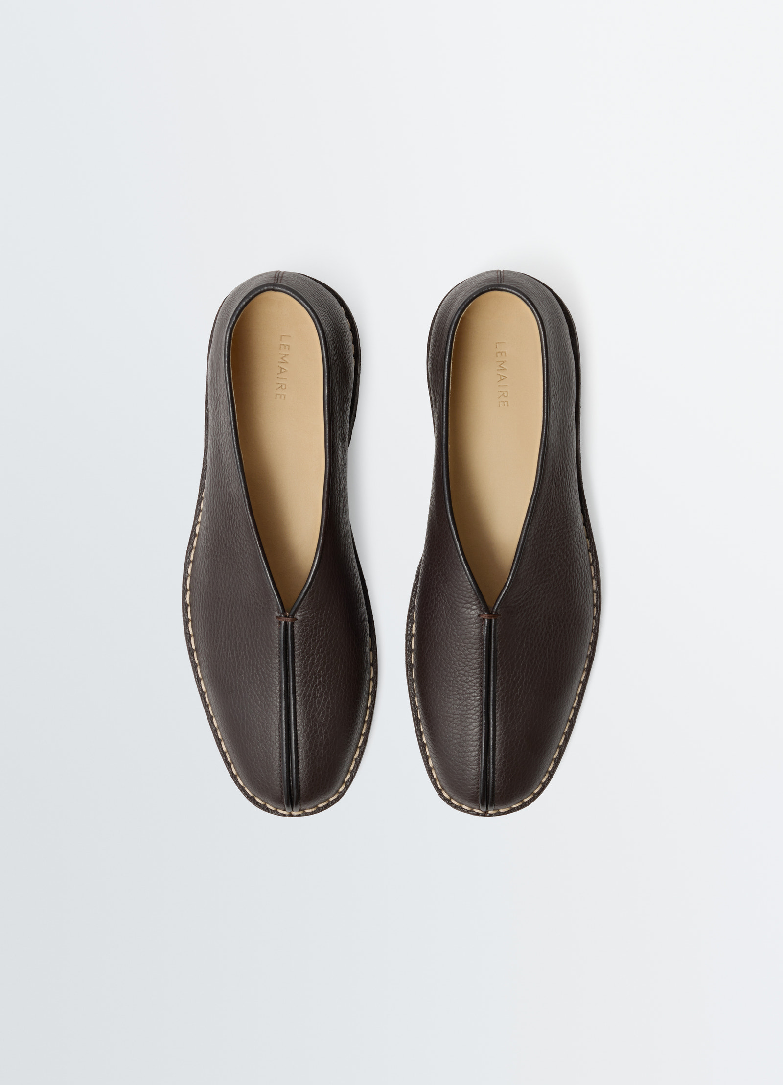 Piped crepe slippers in leather