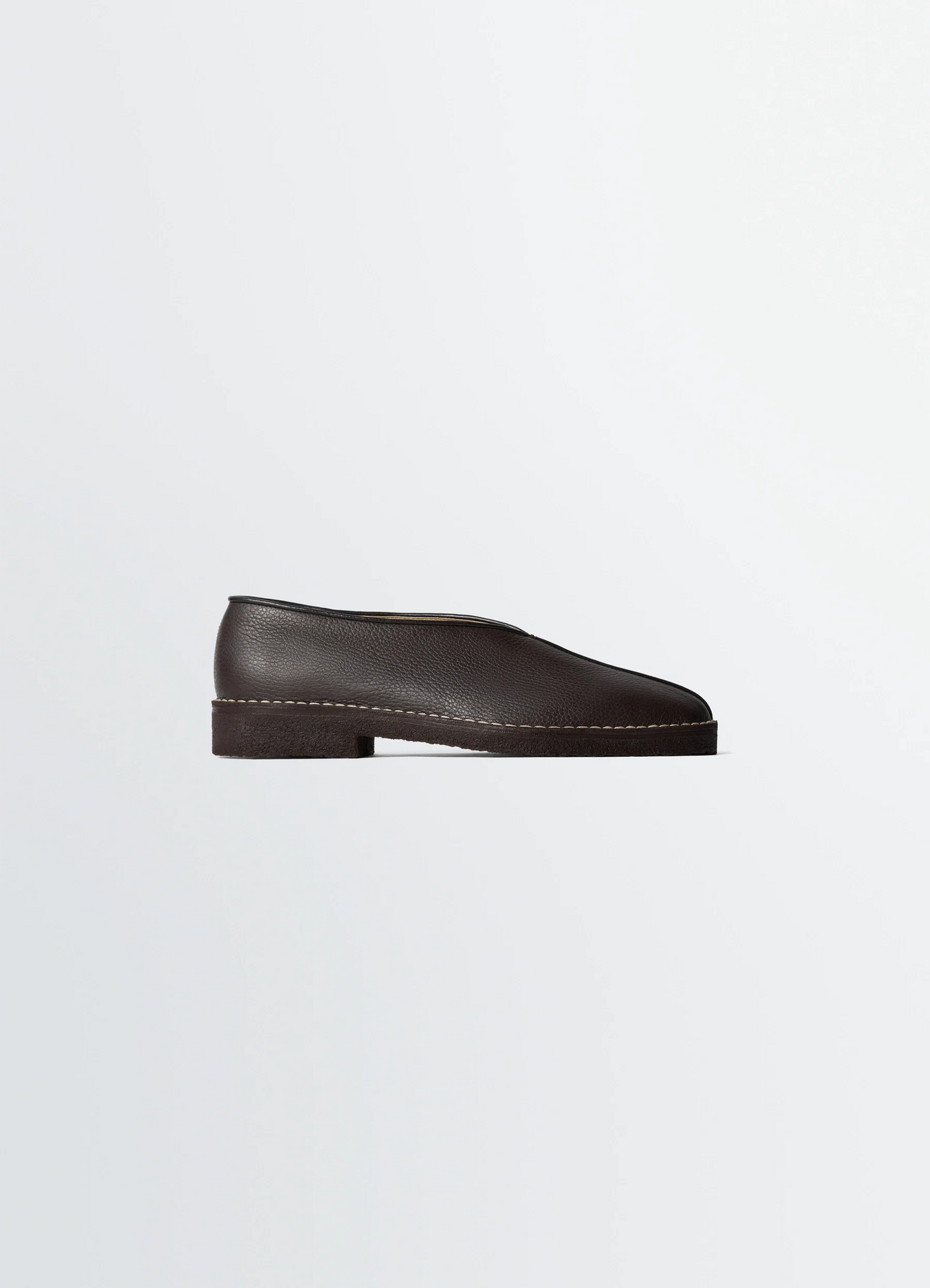 Lemaire piped crepe slippers in leather, product shot, side view square toe piping