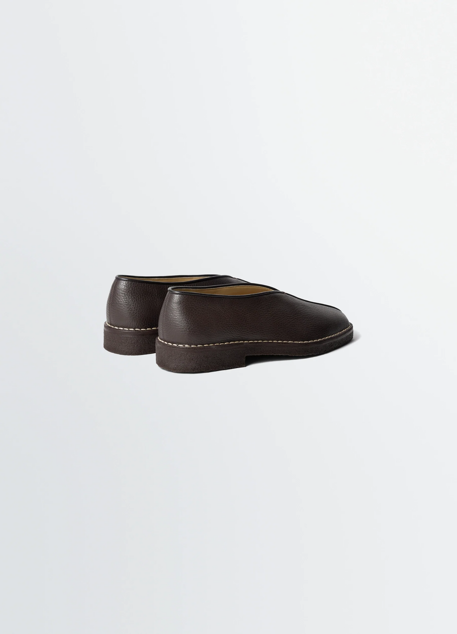 Lemaire piped crepe slippers in leather, product shot, back view contrast stitching