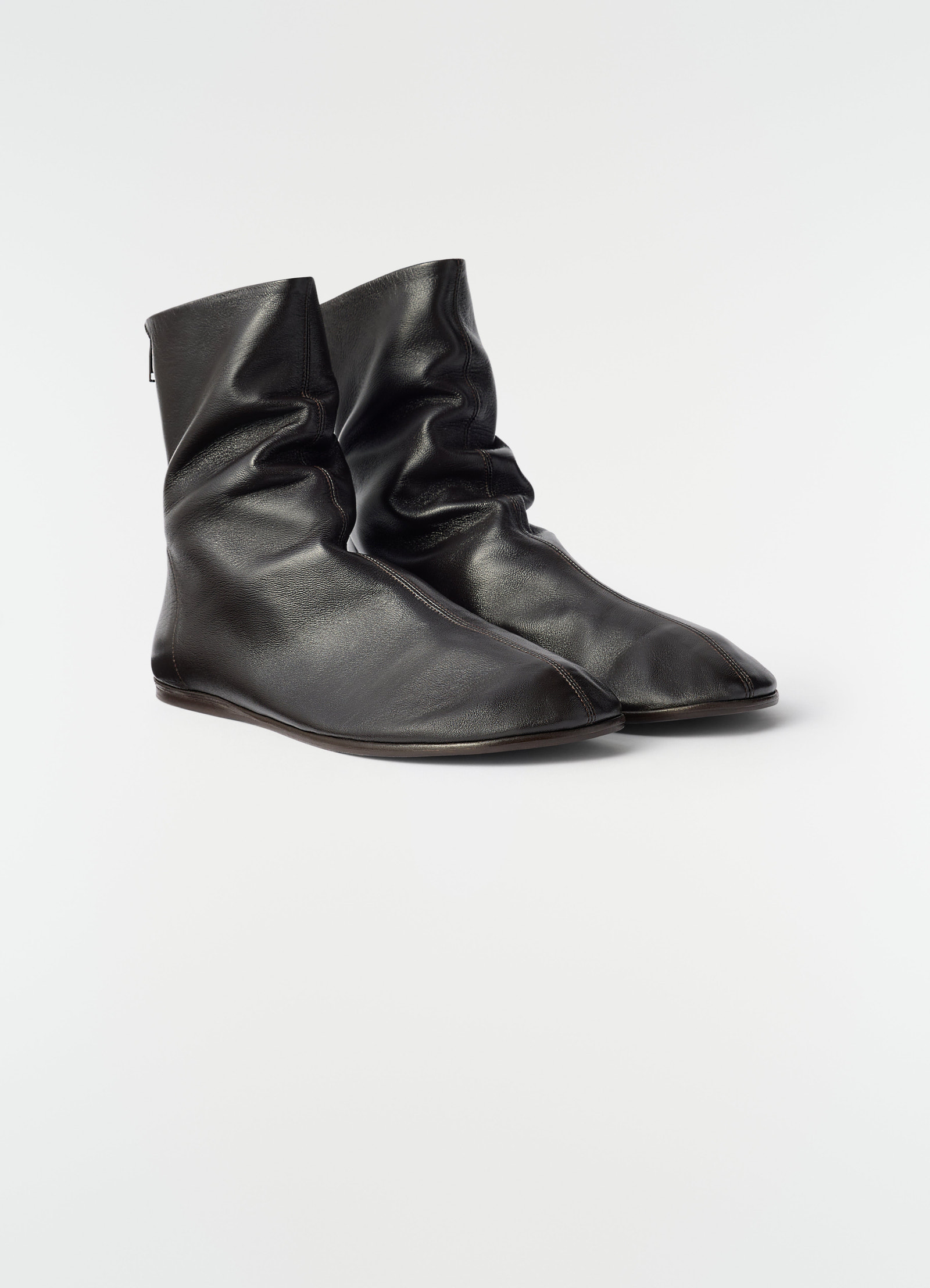 Sock ankle boots black nappa lambskin leather lemaire styled look front side view
