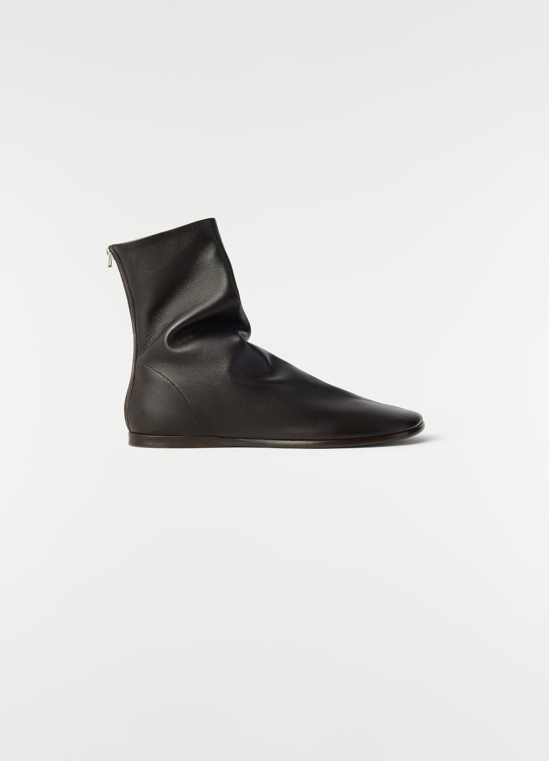 Flat glove ankle boots in shiny dark brown nappa lambskin LEMAIRE side view on plain white background