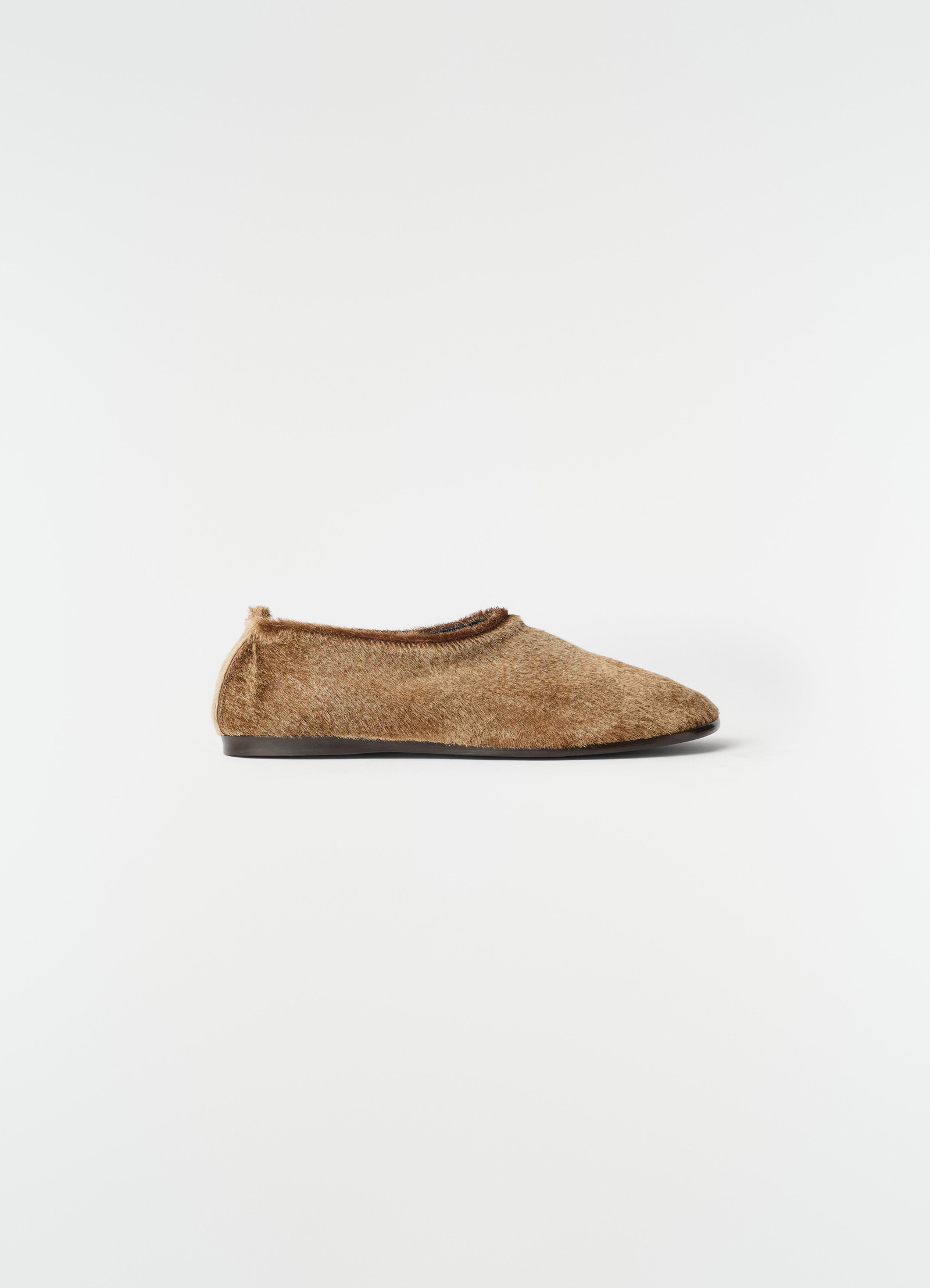 Glove slip-on shoes in natural brown pony-style leather by lemaire side view on white background