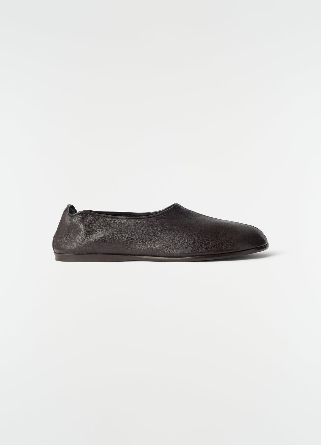 Sock slip-ons in dark brown goat leather by LEMAIRE side view on plain white background