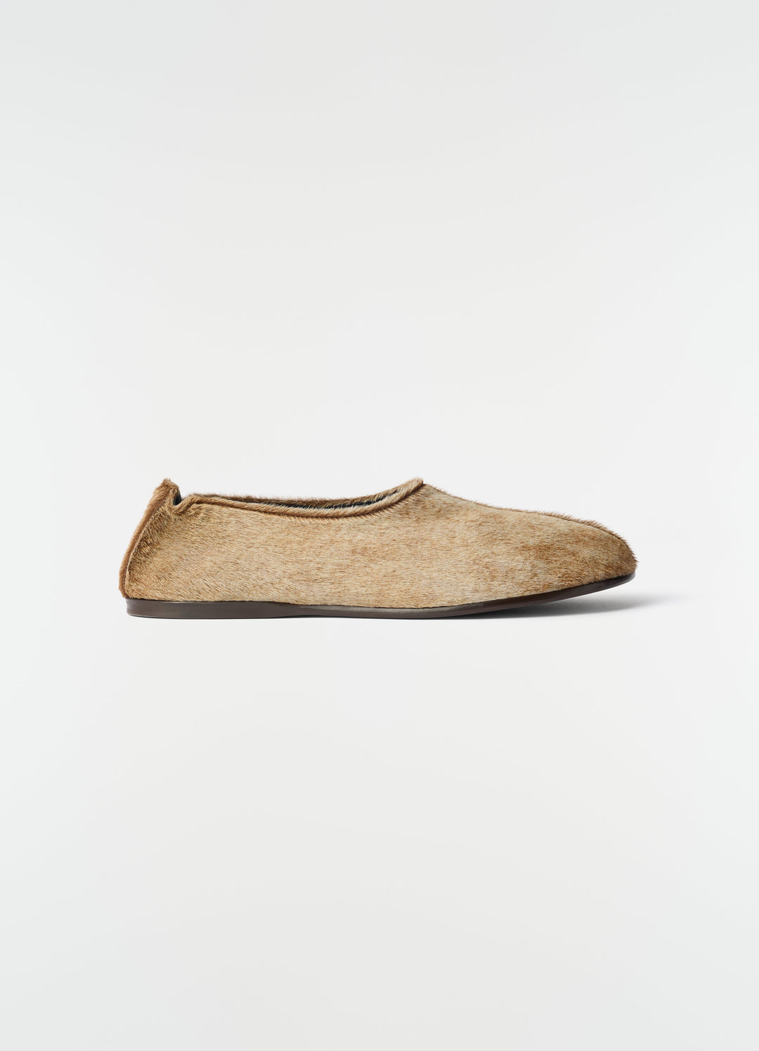 Sock slip-ons in natural pony-style leather with dark sole LEMAIRE side view on white background