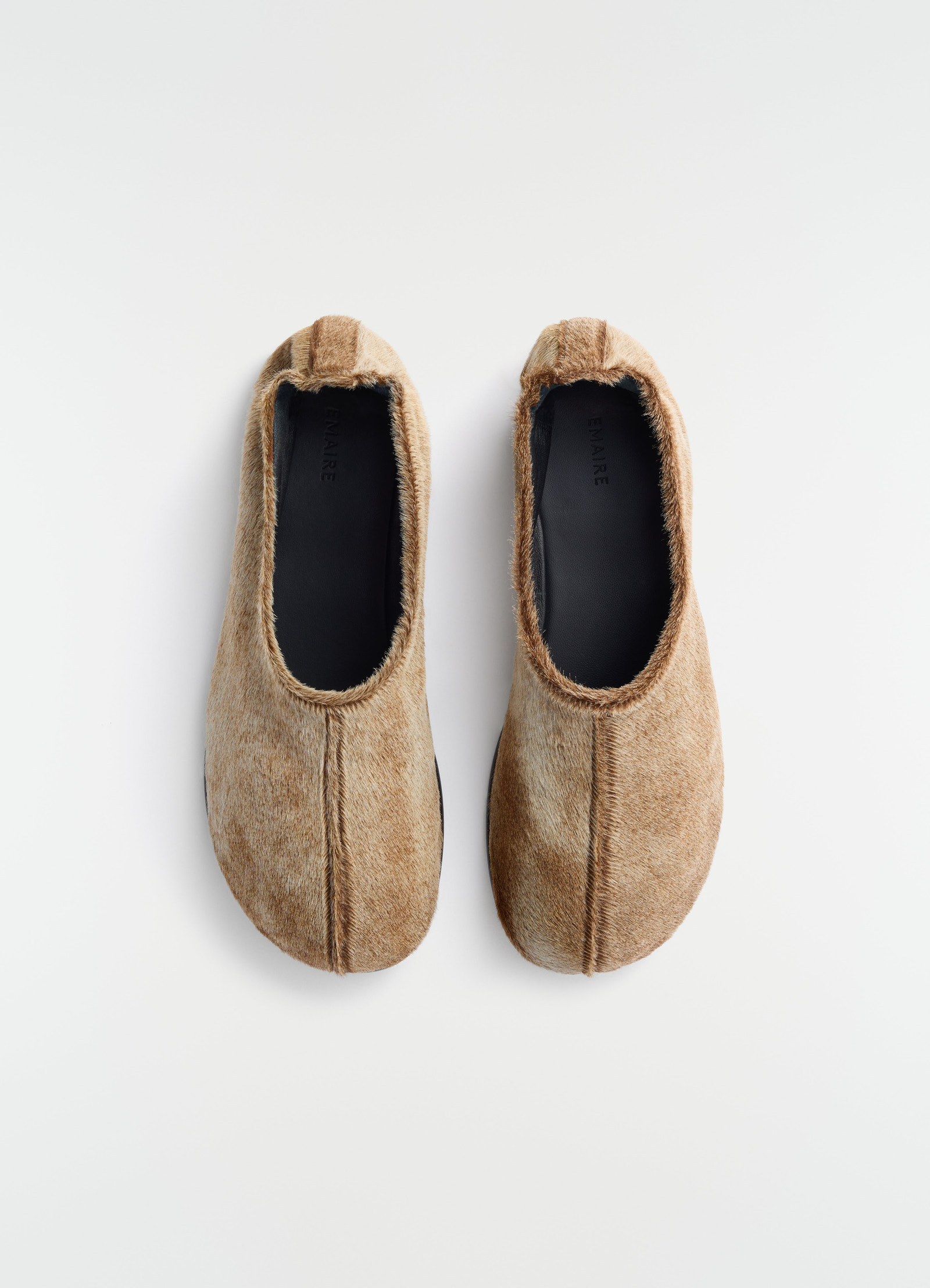 Sock slip-ons in natural pony-style leather lemaire flat front view on plain white background