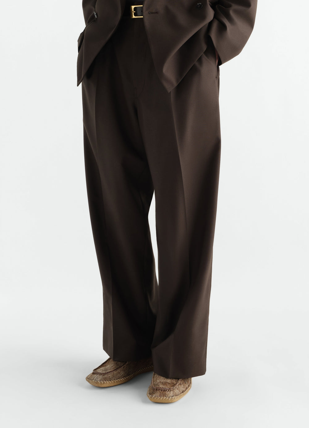 Desert moccasins pony-style leather brown worn by model LEMAIRE front view close-up